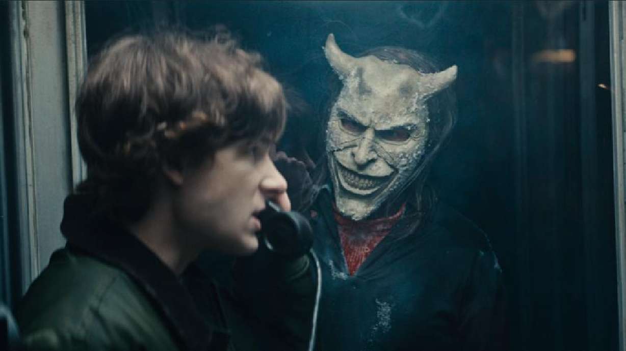 Mason Thames as Finney and Ethan Hawke as the Grabber in "Black Phone 2."