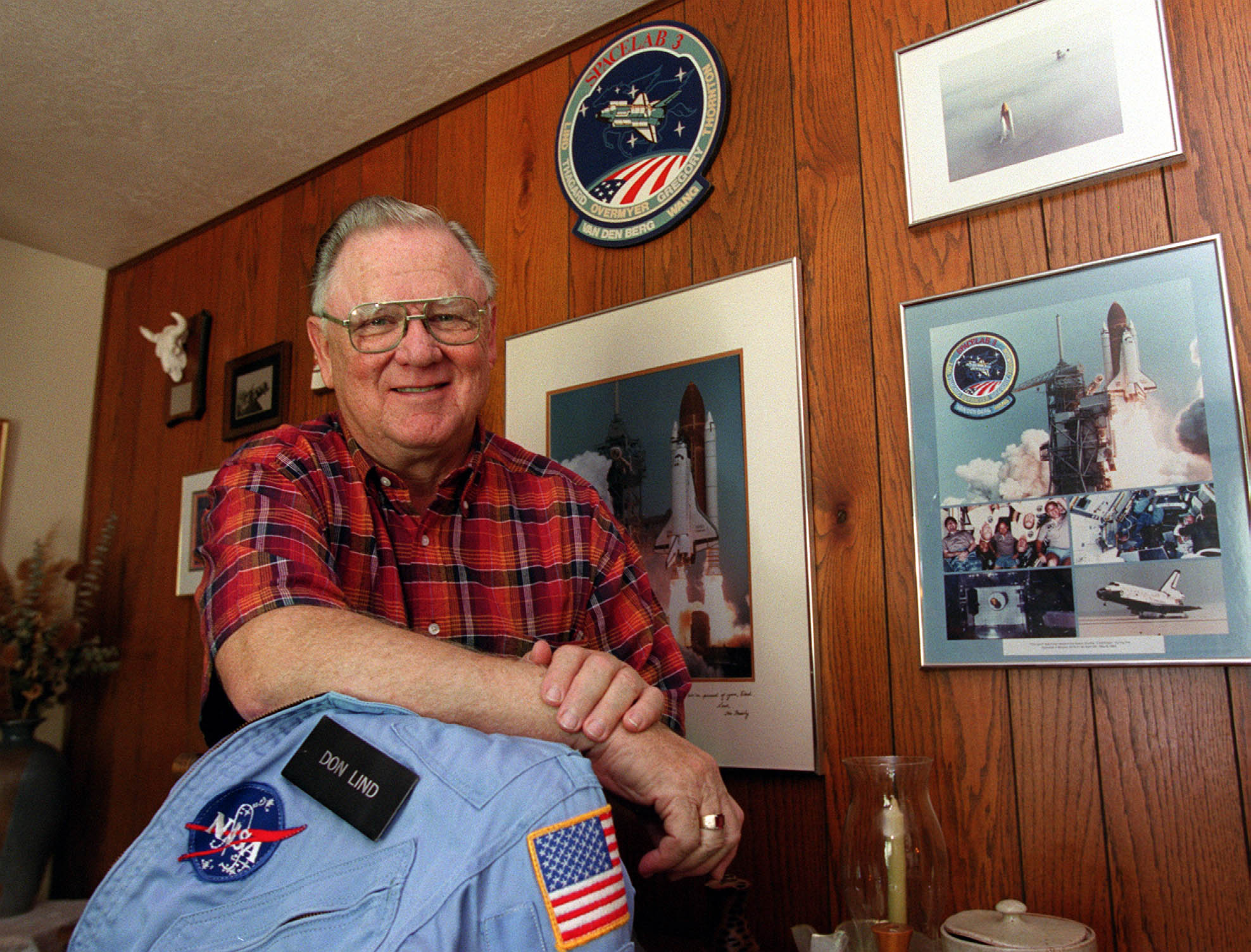 Astronaut Don Lind with some things he collected.