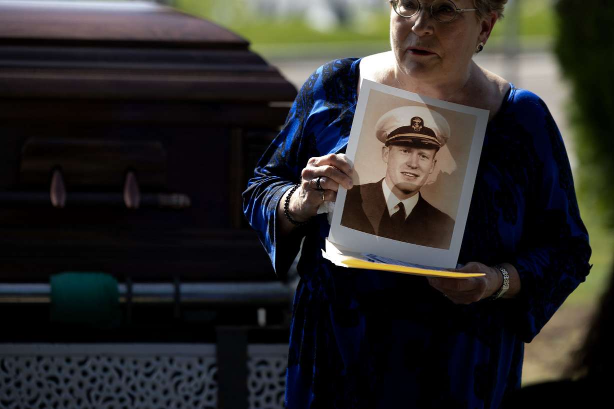 Terri Trick memorializes her uncle, Utah native Ensign Howard Holding, during his graveside ceremony in the Salt Lake City Cemetery on Friday.