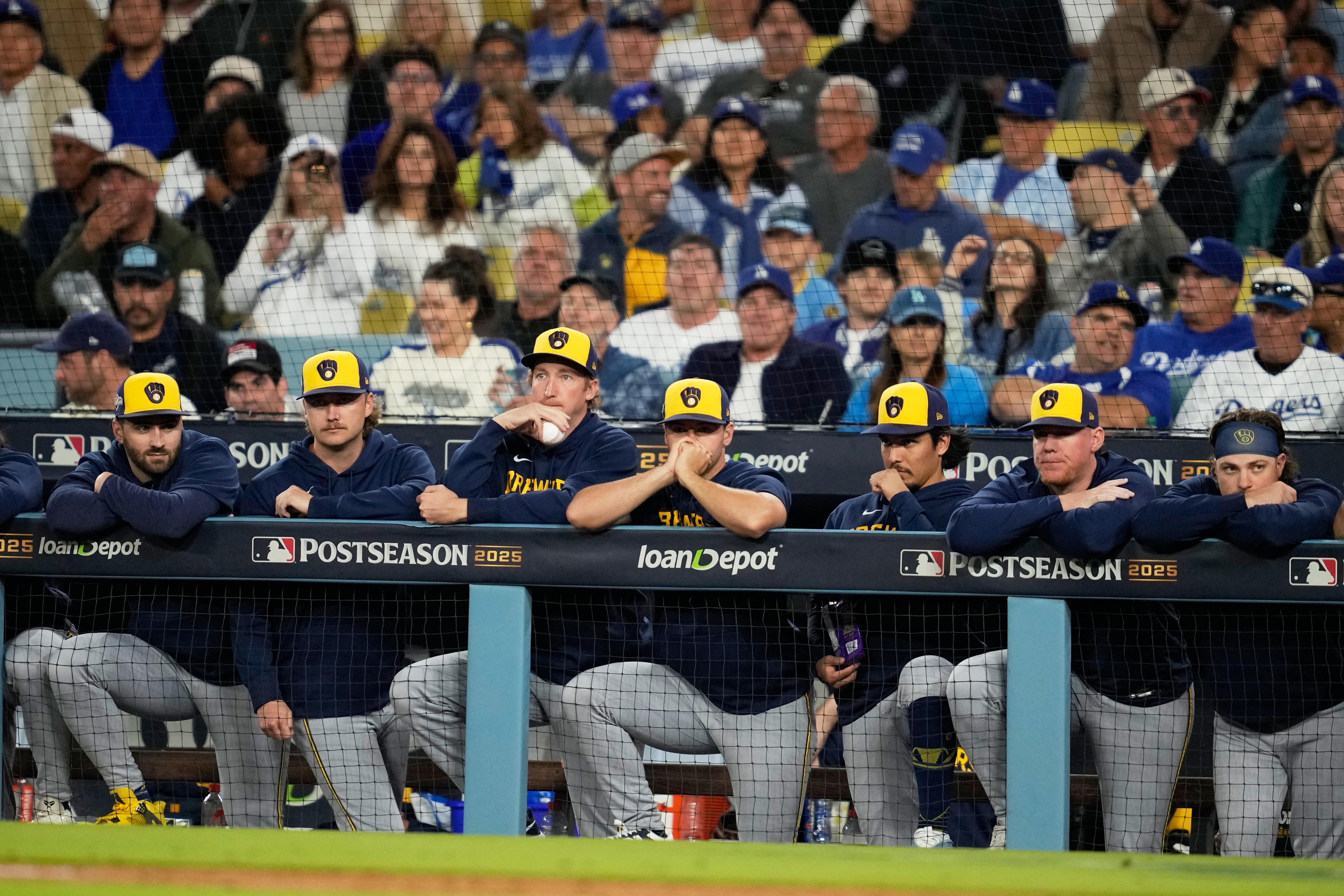 Members of the Milwaukee Brewers watch during the eighth inning in Game 4 of baseball's National League Championship Series against the Los Angeles Dodgers, Friday, Oct. 17, 2025, in Los Angeles. 