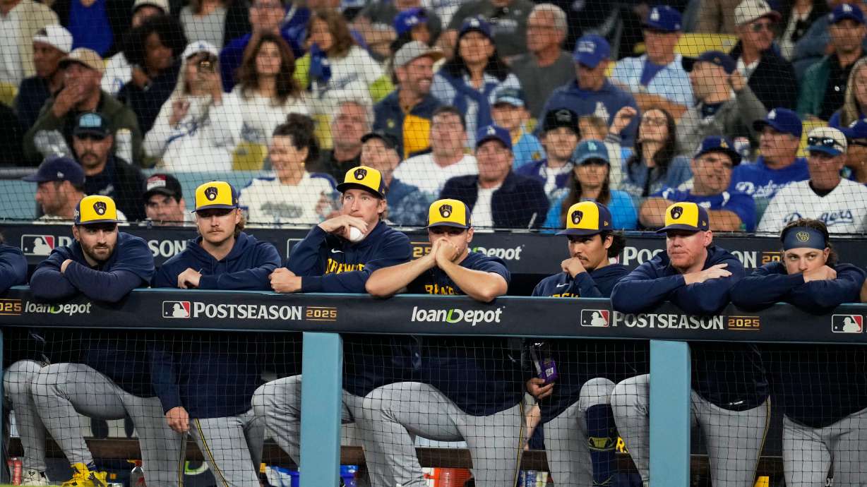 Members of the Milwaukee Brewers watch during the eighth inning in Game 4 of baseball's National League Championship Series against the Los Angeles Dodgers, Friday, Oct. 17, 2025, in Los Angeles.