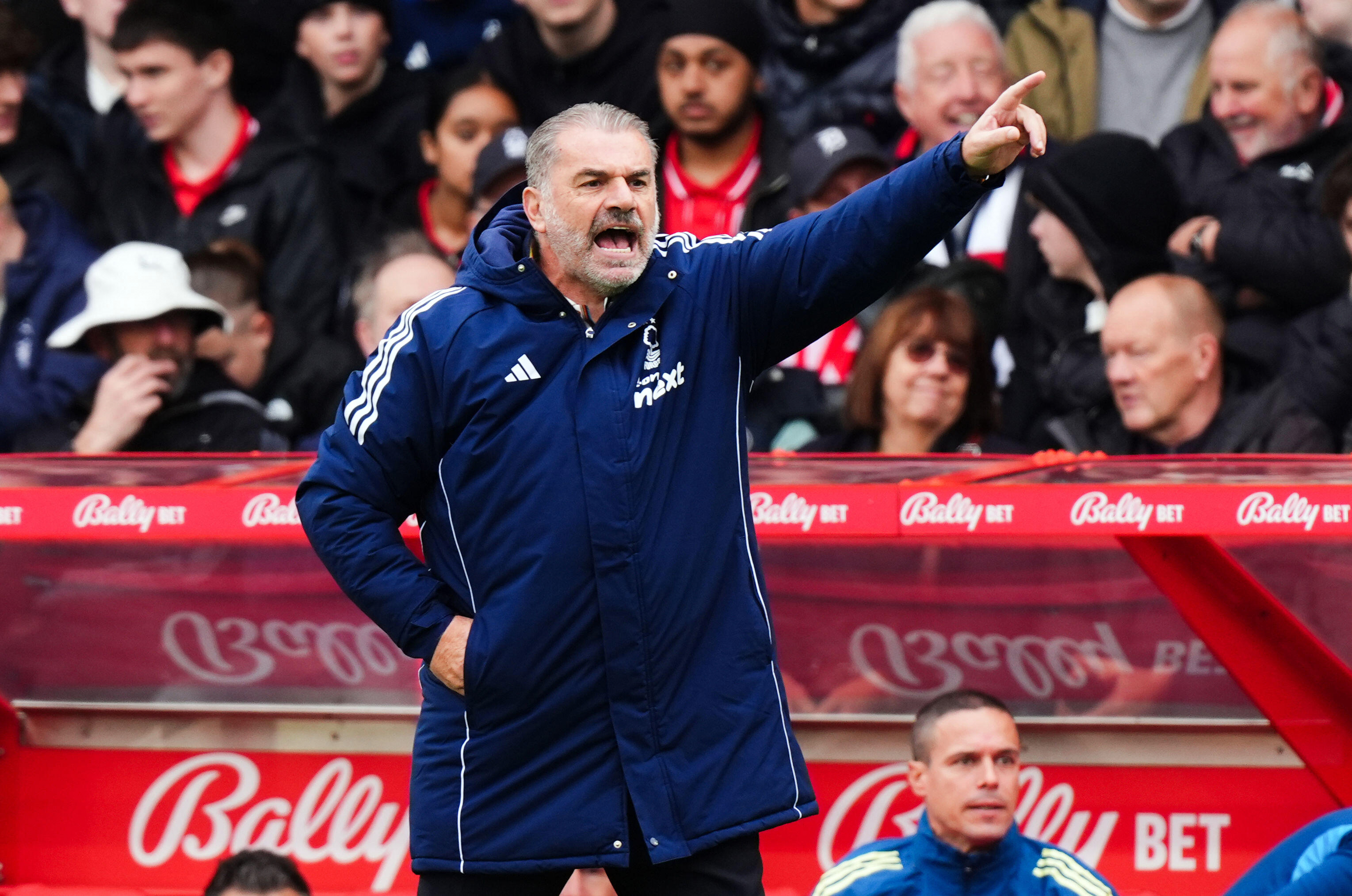 Nottingham Forest head coach Ange Postecoglou shouts instructions, during the English Premier League soccer match between Nottingham Forest and Chelsea, in Nottingham, England, Saturday, Oct. 18, 2025. 