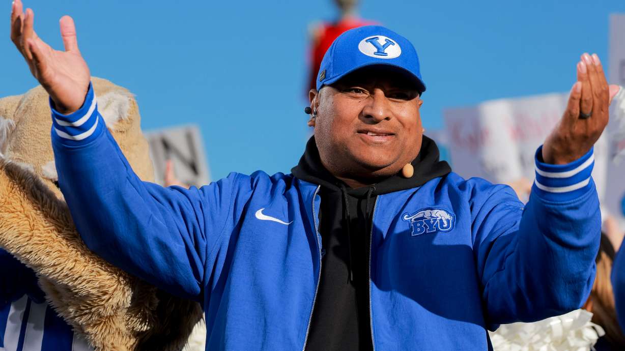 BYU head coach Kalani Sitake hypes up the crowd during Fox’s “Big Noon Kickoff” show at Brigham Young University in Provo on Saturday, Oct. 18, 2025.