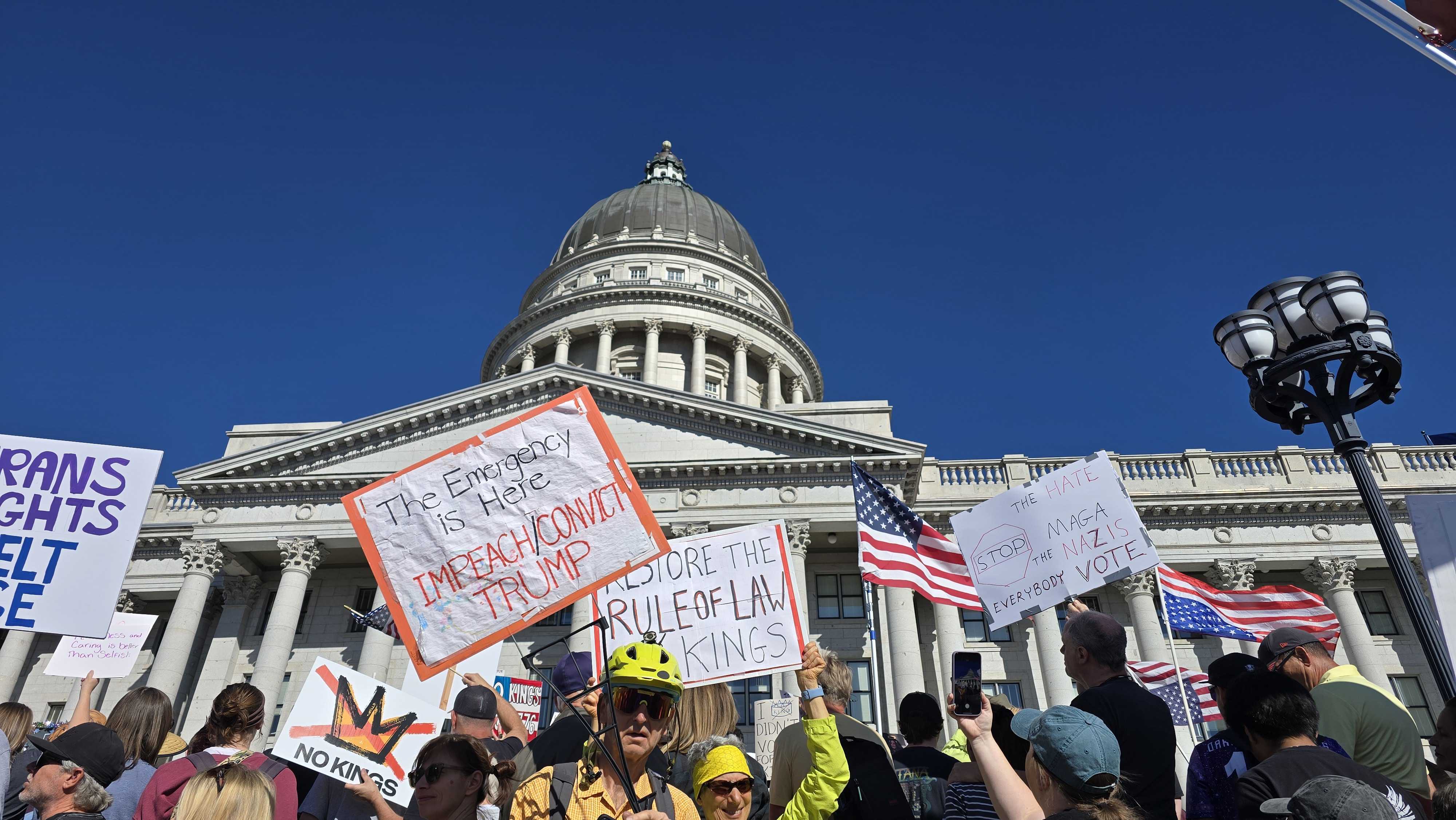 Protesters participate in a "No Kings" rally at the state Capitol in Salt Lake City on Saturday. It was one of several protests in Utah and among more than 2,600 nationwide.
