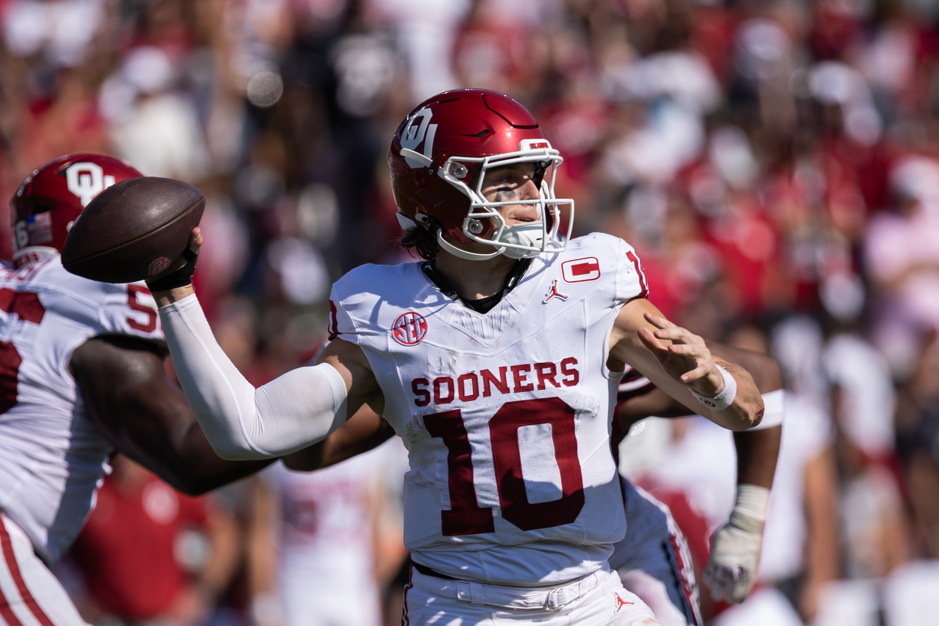 Oklahoma quarterback John Mateer (10) throws a pass during the second half of an NCAA college football game against South Carolina, Saturday, Oct. 18, 2025, in Columbia, S.C.