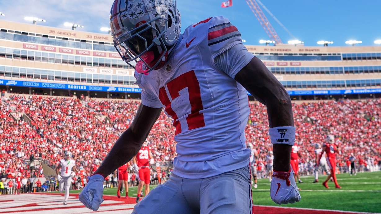 Ohio State's Carnell Tate celebrates his touchdown catch during the first half of an NCAA college football game against the Wisconsin Saturday, Oct. 18, 2025, in Madison, Wis.