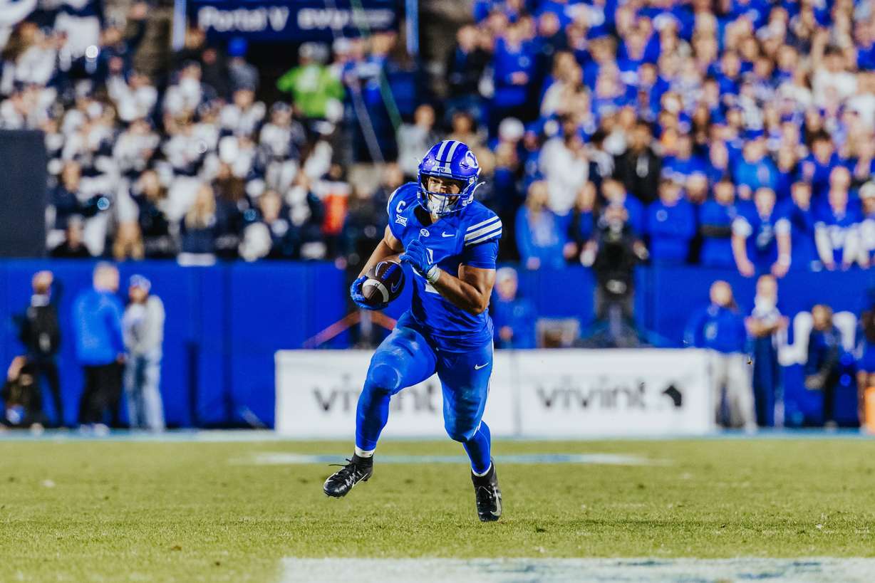 BYU running back LJ Martin runs for yardage during the Cougars' 24-21 win over the University of Utah, Saturday, Oct. 18, 2025 at LaVell Edwards Stadium in Provo, Utah.