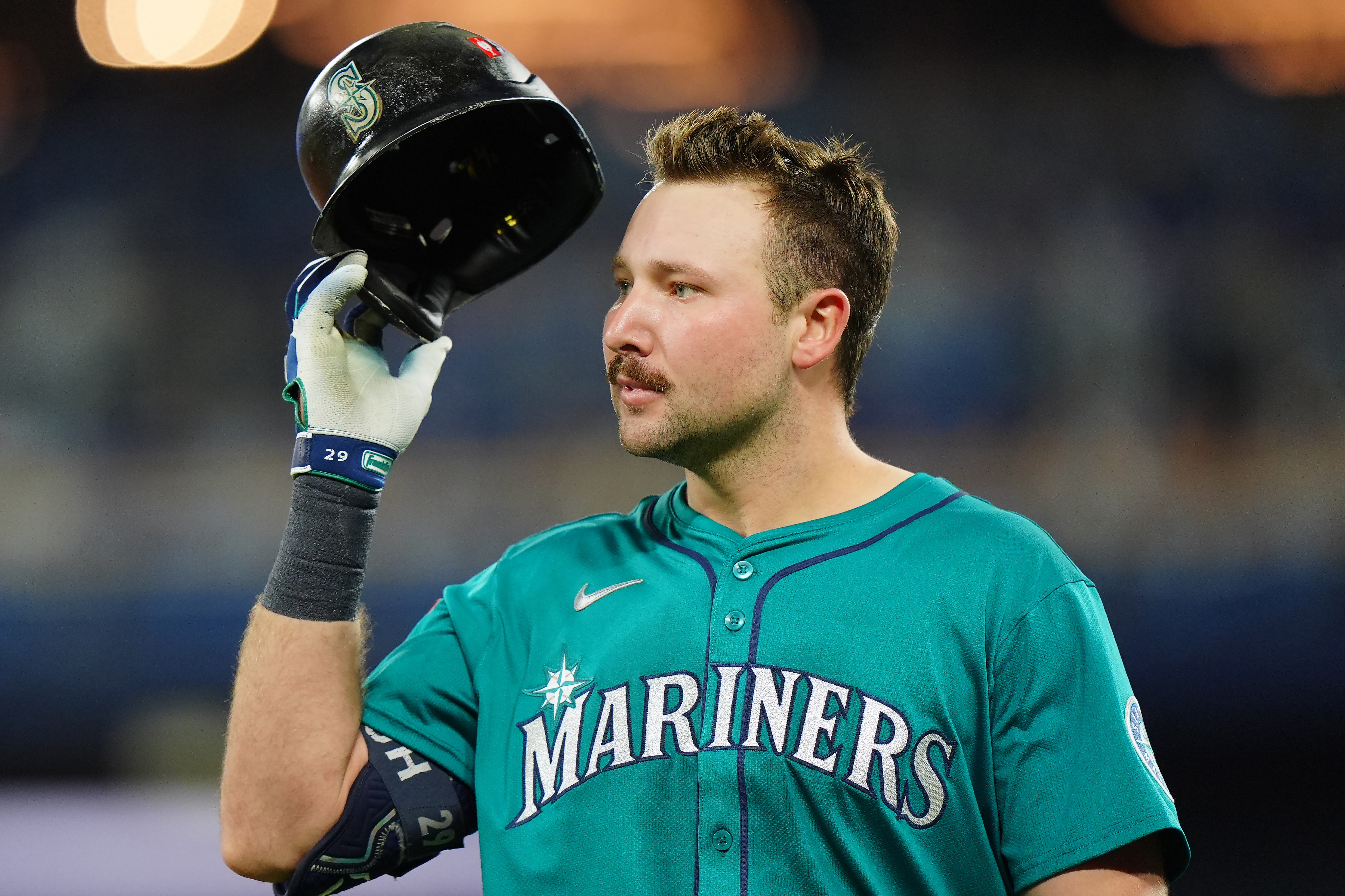 Seattle Mariners' Cal Raleigh reacts after grounding into a double play during the third inning of Game 6 of baseball's American League Championship Series against the Toronto Blue Jays in Toronto, Sunday, Oct. 19, 2025. 