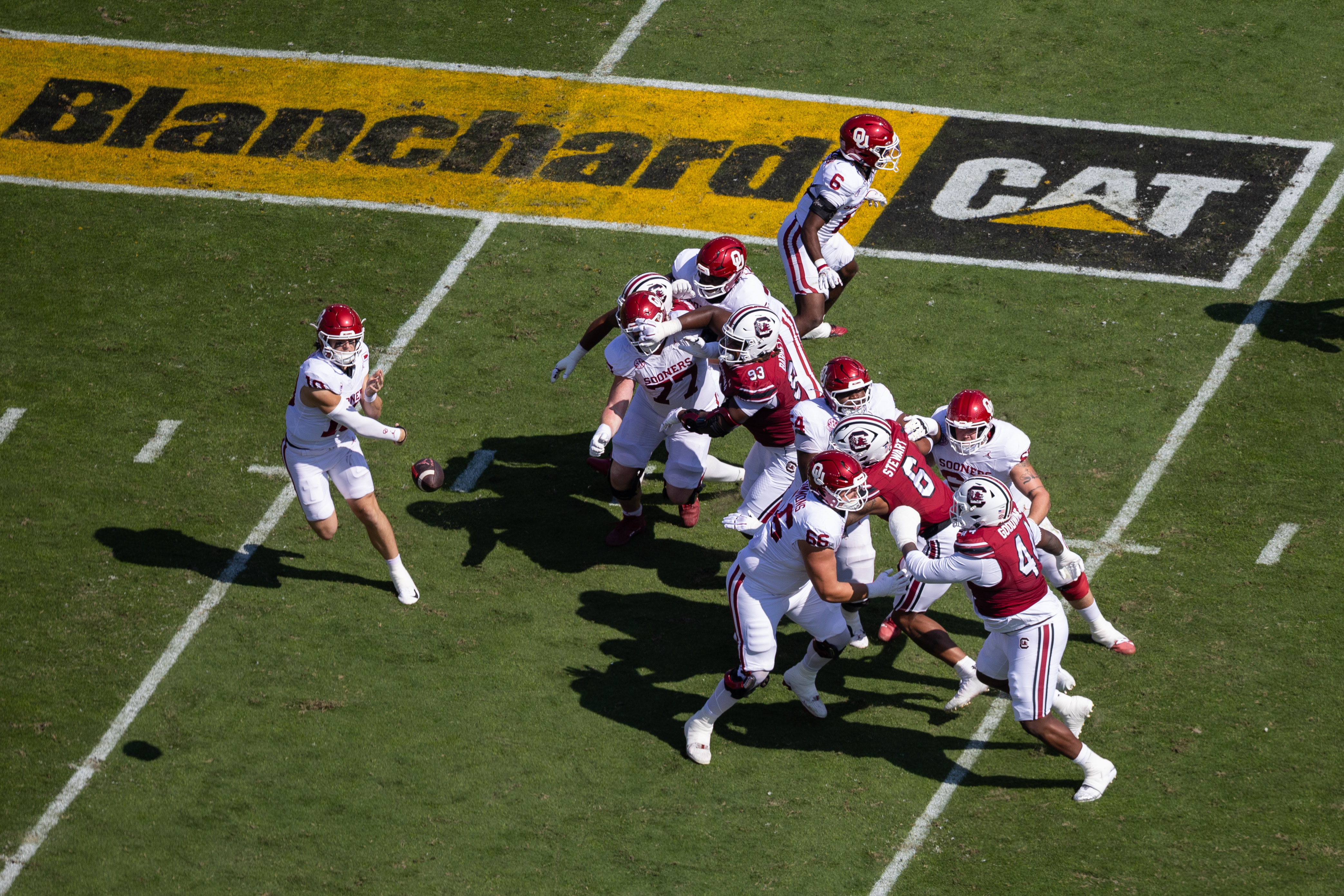 A Blanchard Cat logo is displayed on the field as Oklahoma quarterback John Mateer (10) throws against South Carolina during an NCAA college football game, Saturday, Oct. 18, 2025, in Columbia, S.C. 