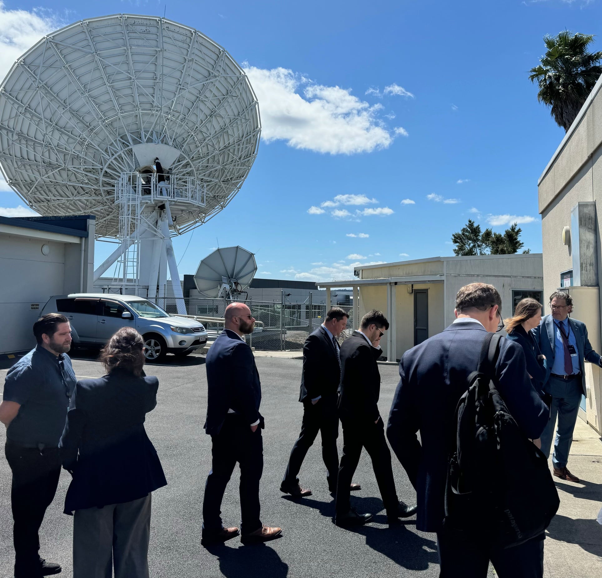 Delegates from the World Trade Center Utah 2025 Trade Mission tour the Viasat satellite communication system facility in Auckland, New Zealand, on Monday.