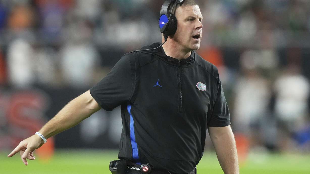 Florida head coach Billy Napier gestures during the second half of an NCAA college football game against Miami, Saturday, Sept. 20, 2025, in Miami Gardens, Fla.