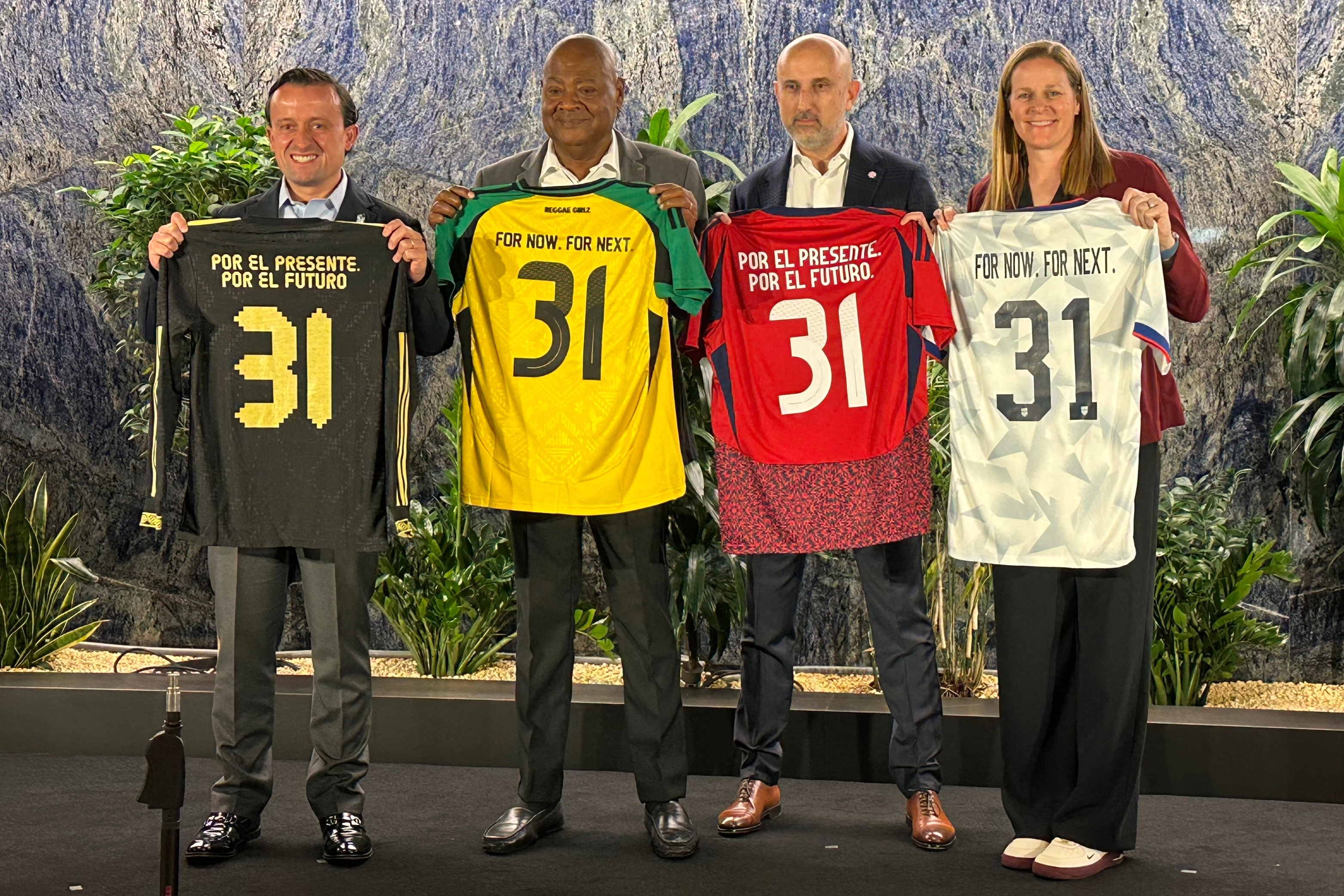 From left to right, Mexican Football Federation president Mikel Arriola, Jamaica Football Federation president Michael Ricketts, Costa Rican Football Federation president Osael Maroto Martínez and U.S. Soccer president Cindy Parlow Cone pose with jerseys at a news conference in New York, Monday, Oct. 20, 2025, to announce the four nations had joined a proposal to co-host the 2031 Women's World Cup, the only bid being considered by FIFA. 