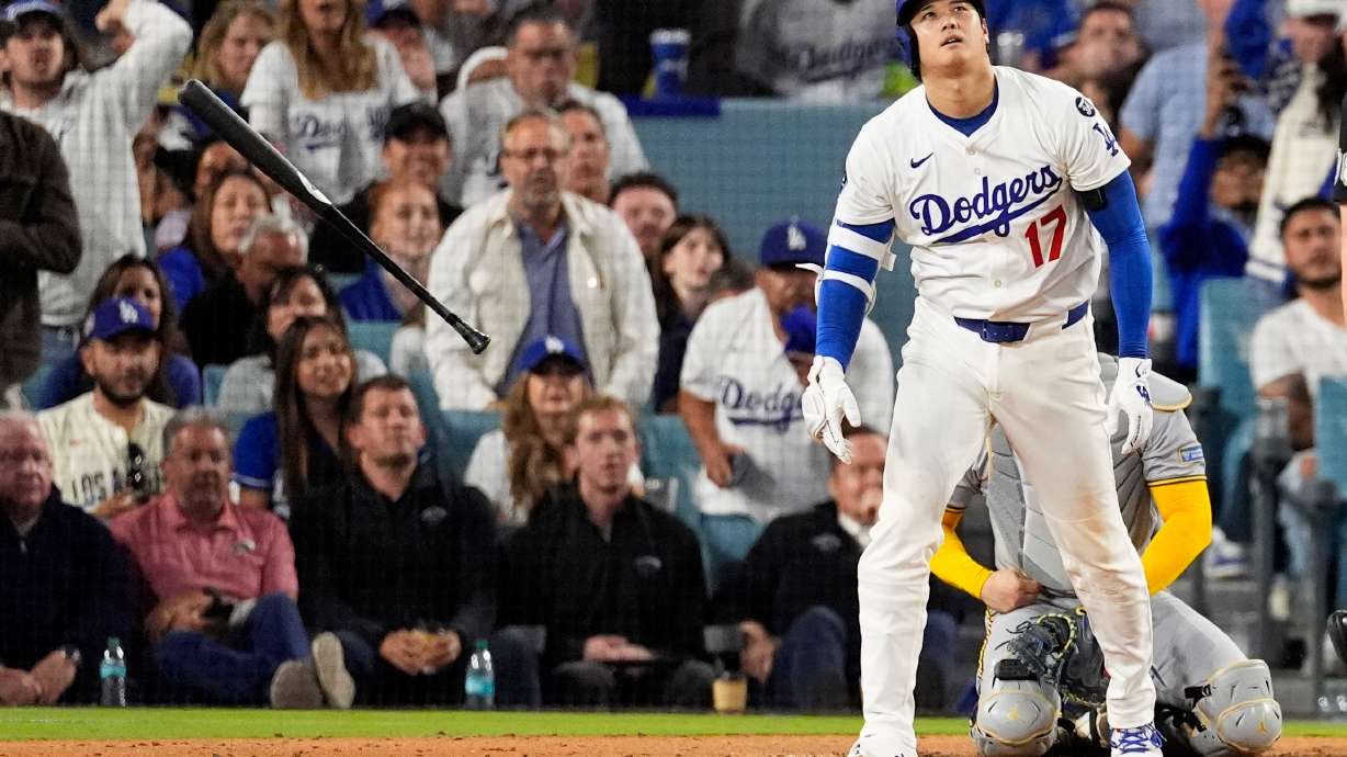 Los Angeles Dodgers' Shohei Ohtani watches his home run against the Milwaukee Brewers during the fourth inning in Game 4 of baseball's National League Championship Series, Friday, Oct. 17, 2025, in Los Angeles.