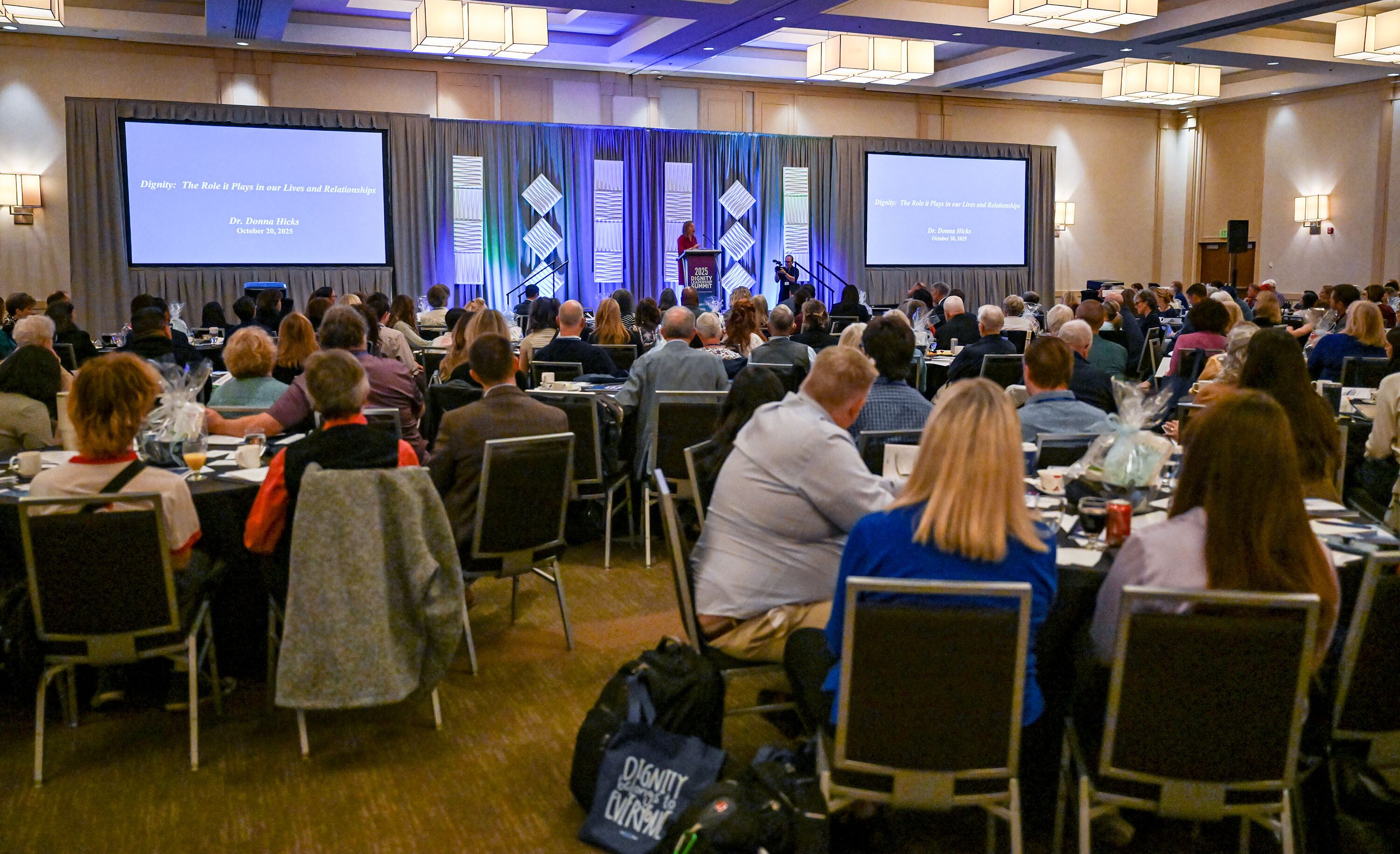 Donna Hicks, an international conflict resolution specialist, an associate at the Weatherhead Center for International Affairs at Harvard University and author of "Leading with Dignity," speaks at the Dignity Index Summit at the Salt Lake Hilton on Monday.
