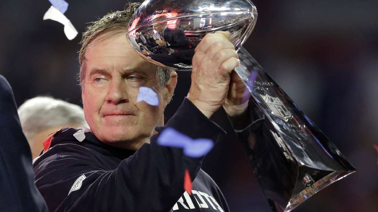 FILE - New England Patriots head coach Bill Belichick holds up the Vince Lombardi Trophy as he celebrates after the Patriots defeated the Seattle Seahawks 28-24 in NFL Super Bowl XLIX football game Sunday, Feb. 1, 2015, in Glendale, Ariz.