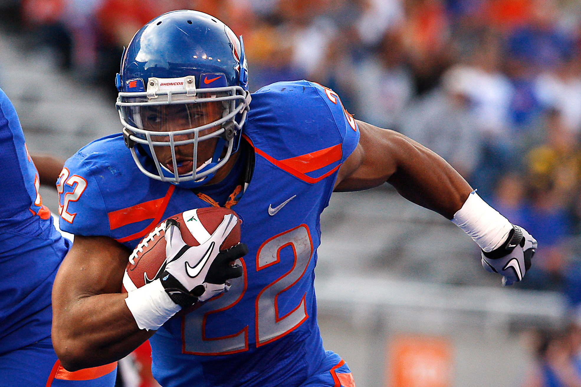 FILE - Boise State's doug Martin runs for a first down during the first half of the NCAA college football game against Toledo, Saturday, Oct. 9, 2010 in Boise, Idaho. 