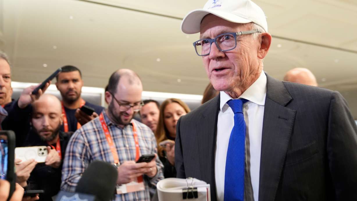 New York Jets owner Woody Johnson talks to reporters before attending an NFL owners meeting in New York, Tuesday, Oct. 21, 2025.