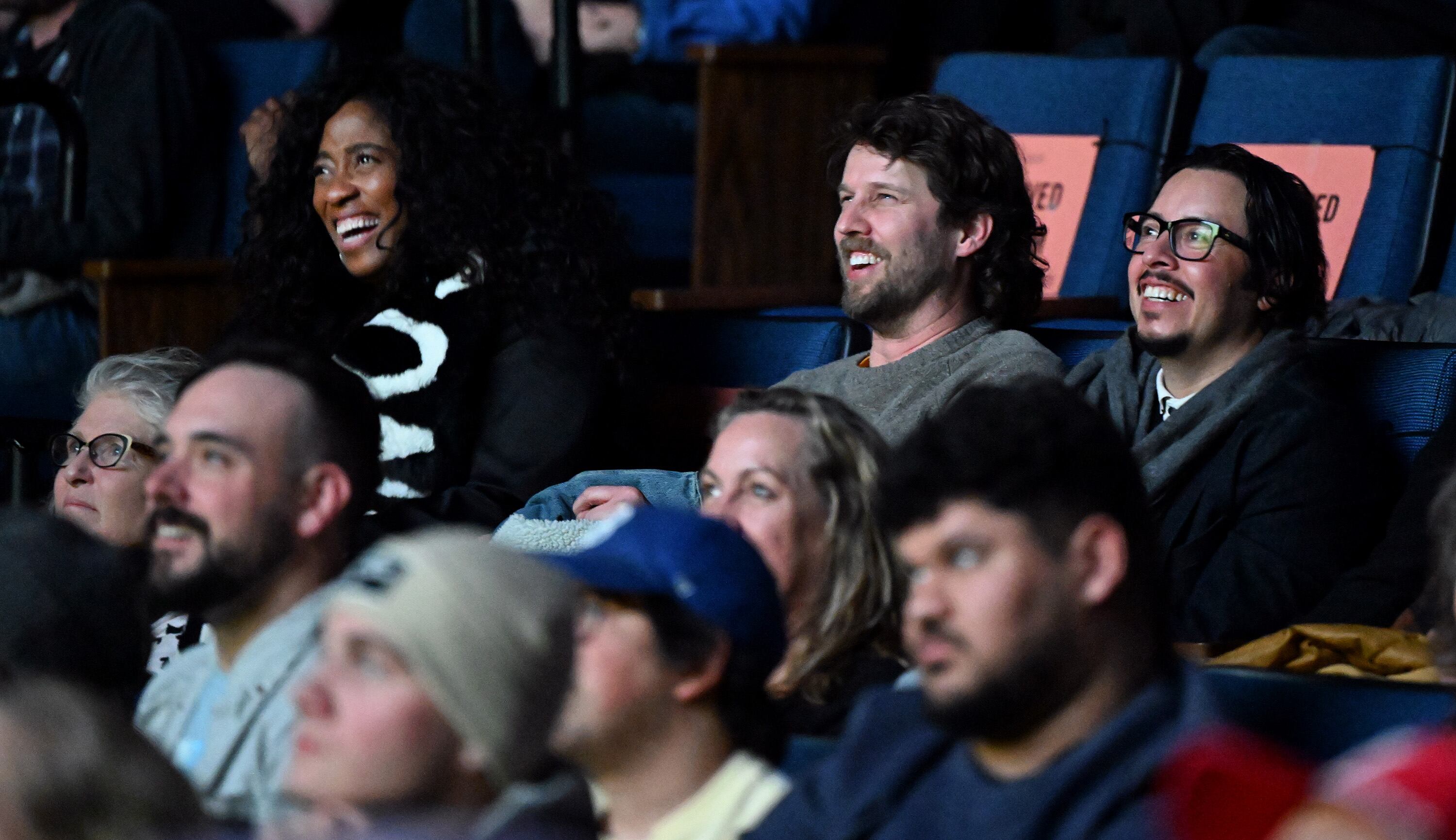 Shondrella Avery (Lafawnduh), Jon Heder (Napoleon Dynamite) and Efren Ramirez (Pedro) laugh as they join the audience in a screening of "Napoleon Dynamite" at Sundance in Park City at the Ray Theatre on Jan. 24, 2024.