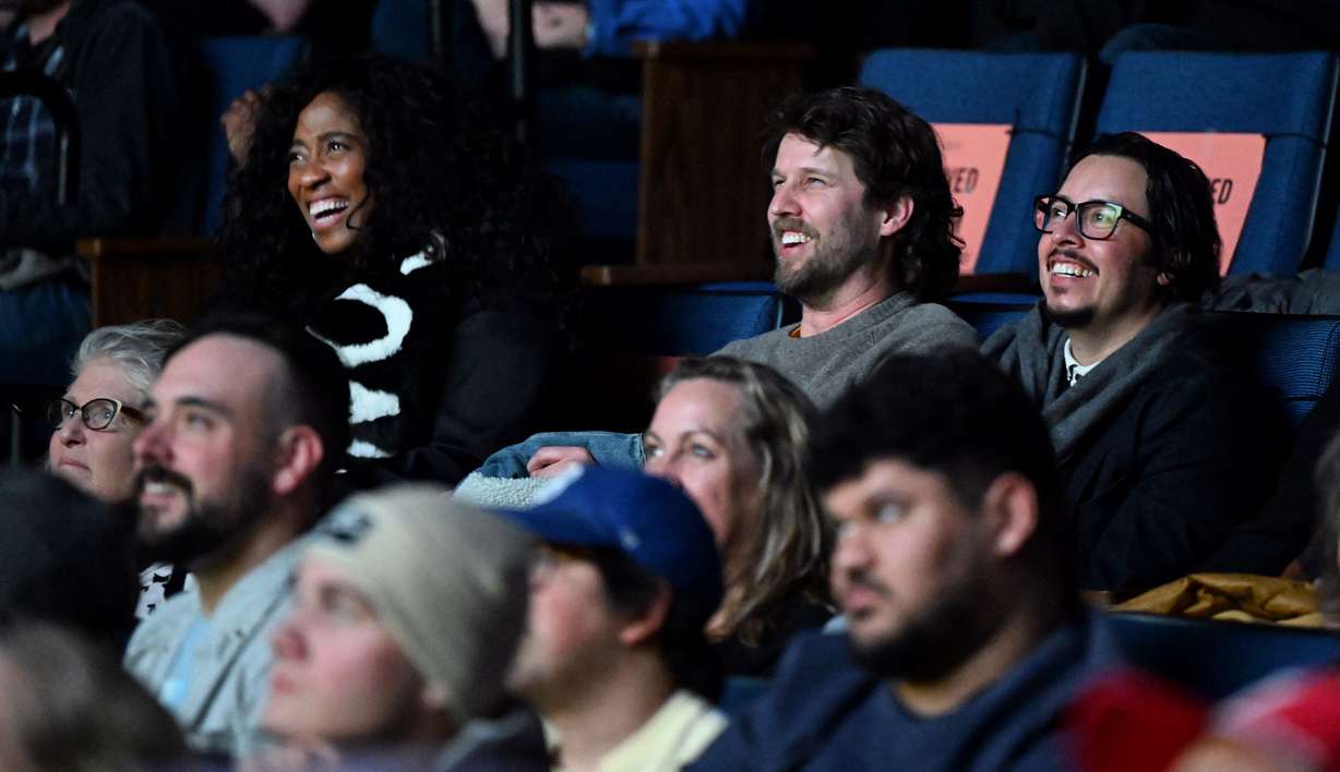 Shondrella Avery (Lafawnduh), Jon Heder (Napoleon Dynamite) and Efren Ramirez (Pedro) laugh as they join the audience in a screening of "Napoleon Dynamite" at Sundance in Park City at the Ray Theatre on Jan. 24, 2024.