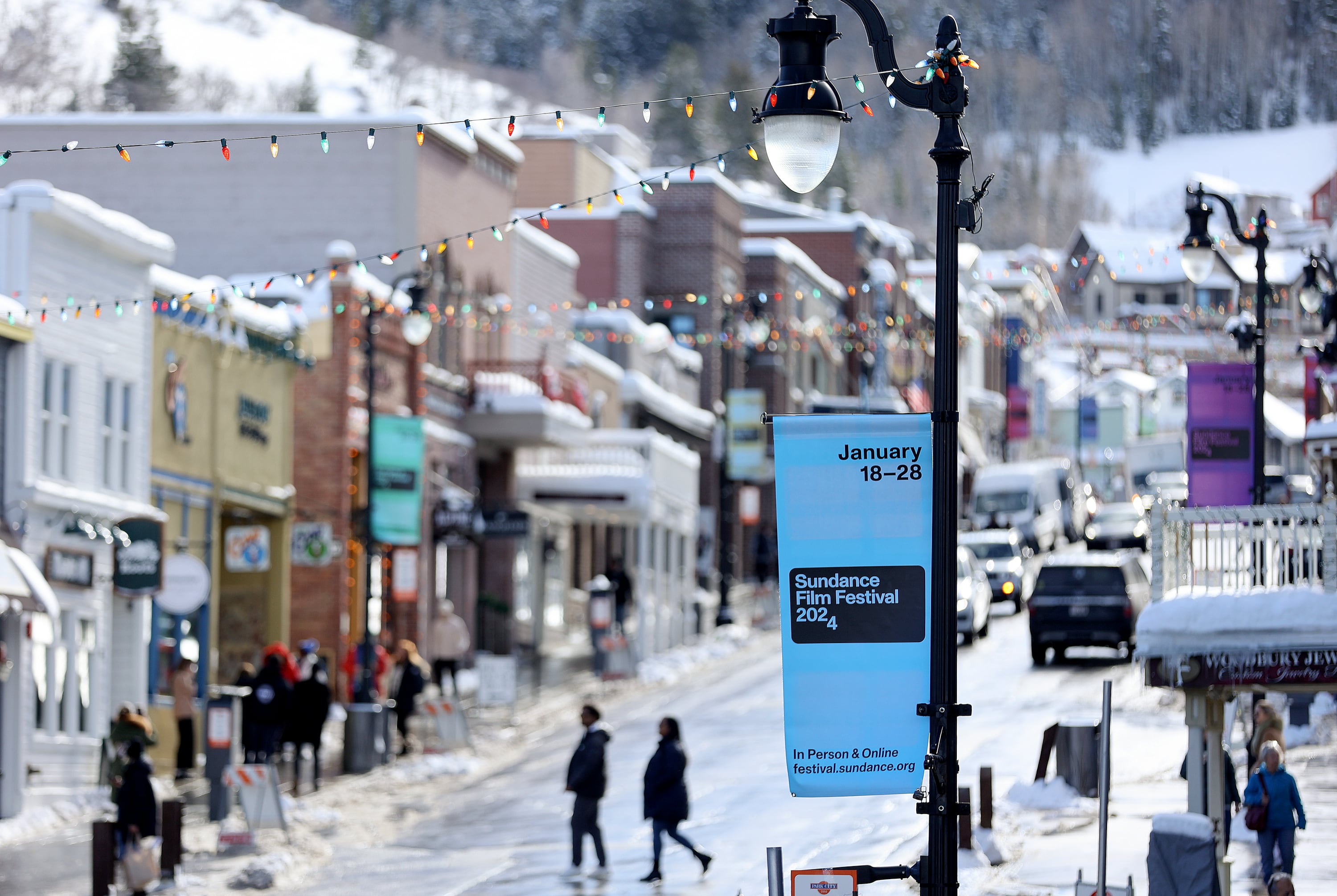 Signs are posted for the 2024 Sundance Film Festival on Main Street in Park City on Jan. 18, 2024.