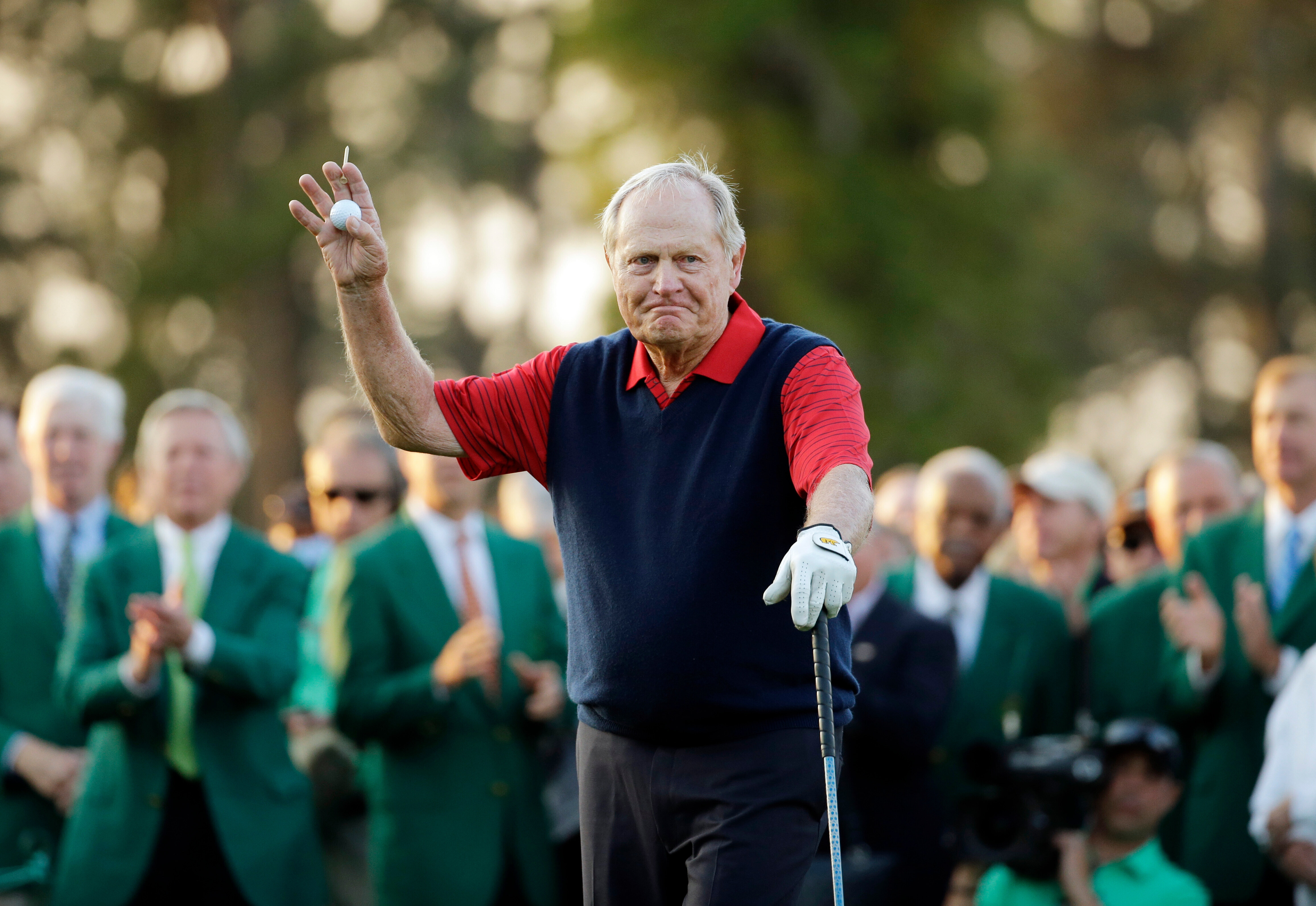 FILE - Jack Nicklaus waves before hitting the first tee for the honorary tee off before the first round of the Masters golf tournament, April 9, 2015, in Augusta, Ga.