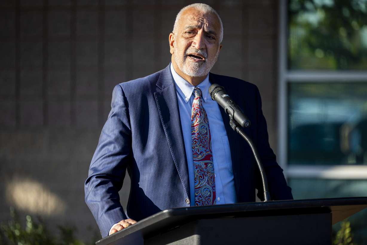 Salt Lake County District Attorney Sim Gill speaks during a vigil to honor the lives lost to gun violence in Utah within the past year, organized by the Gun Violence Prevention Center of Utah and held outside the West Valley City Family Fitness Center in West Valley City on Tuesday, Oct. 21, 2025.