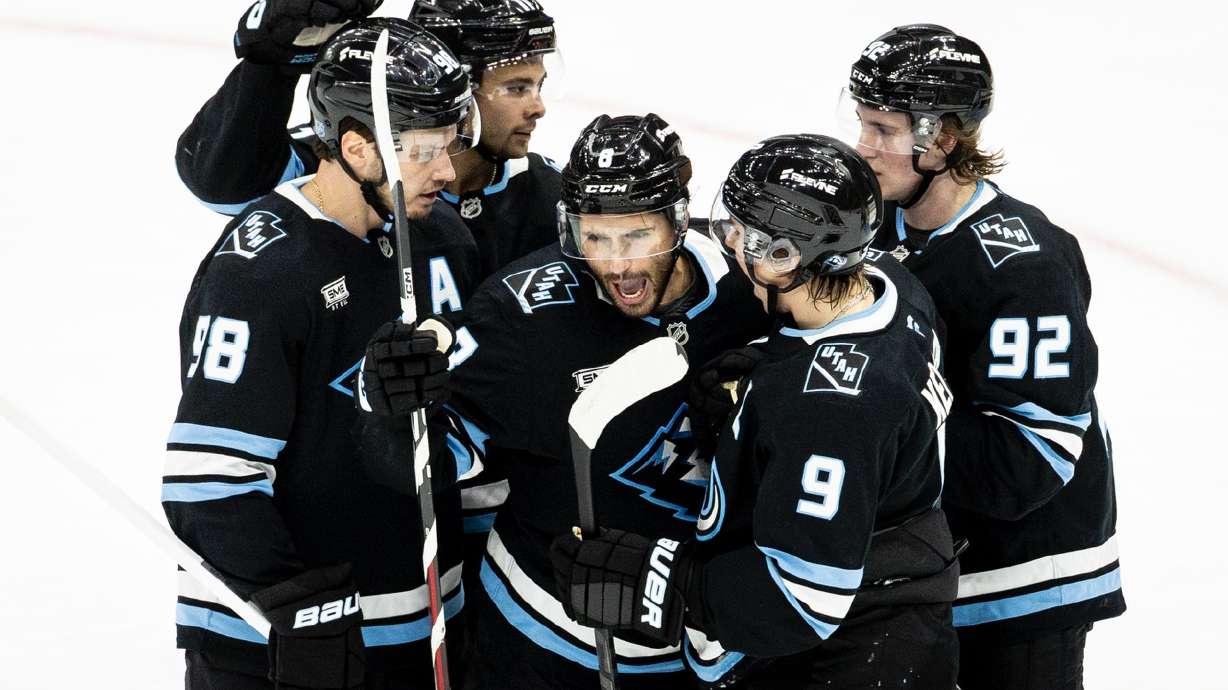 Utah Mammoth center Nick Schmaltz (8) celebrates his goal with his teammates during an NHL game against the Colorado Avalanche held at the Delta Center in Salt Lake City on Tuesday, Oct. 21, 2025.