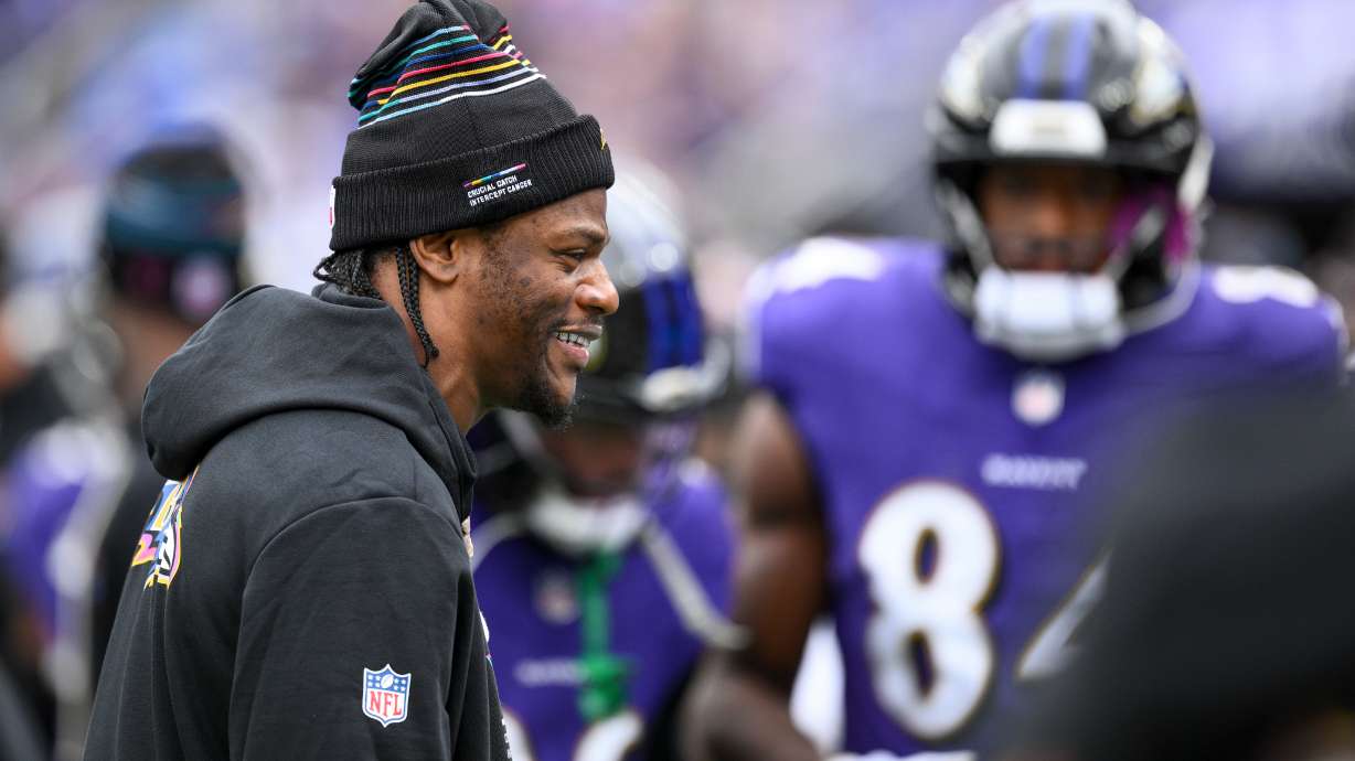 Baltimore Ravens quarterback Lamar Jackson walks on the sideline during the first half of an NFL football game against the Los Angeles Rams Sunday, Oct. 12, 2025, in Baltimore.