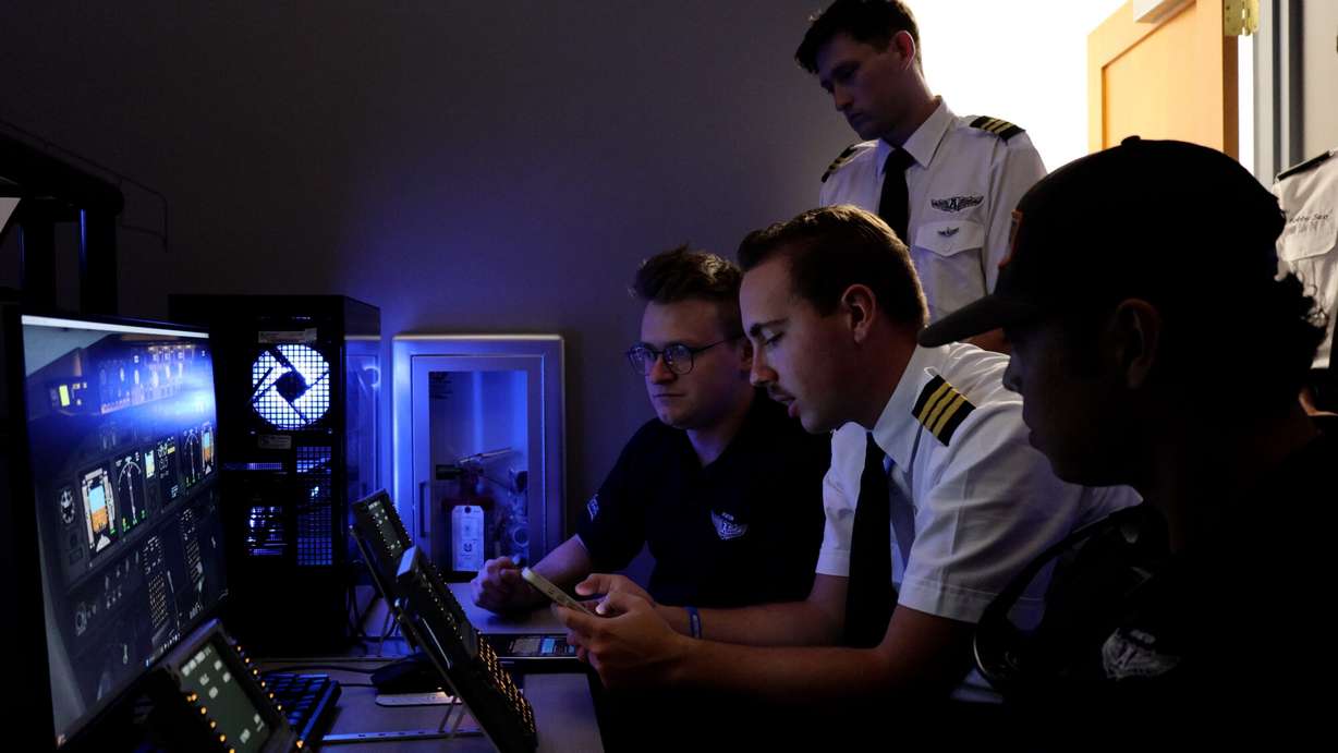 Graduate instructors help students learn how to use navigation instruments at Utah State University, Wednesday. These recent graduate instructors are also gaining valuable experience helping their peers.