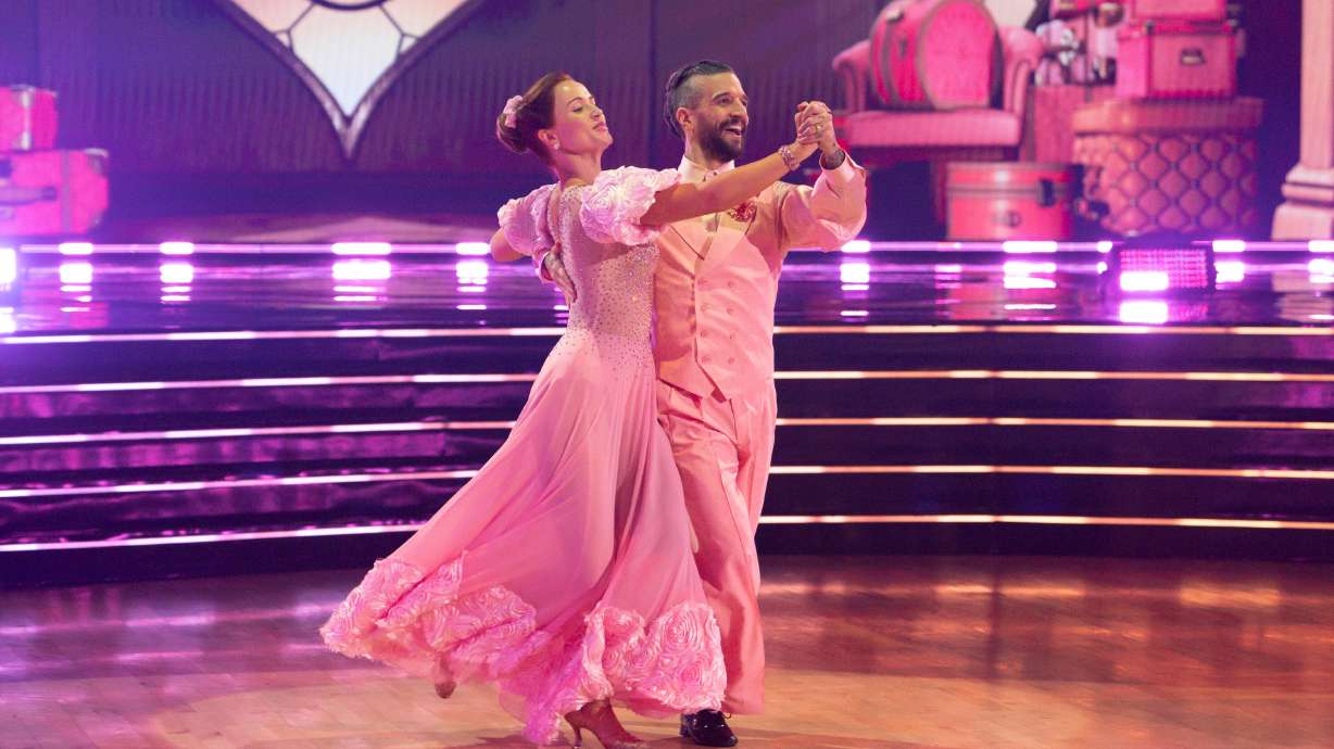 Whitney Leavitt and her dancing partner, Mark Ballas, perform on “Wicked” night during Tuesday's "Dancing with the Stars." Leavitt and Ballas earned the first tens of the season during the episode.