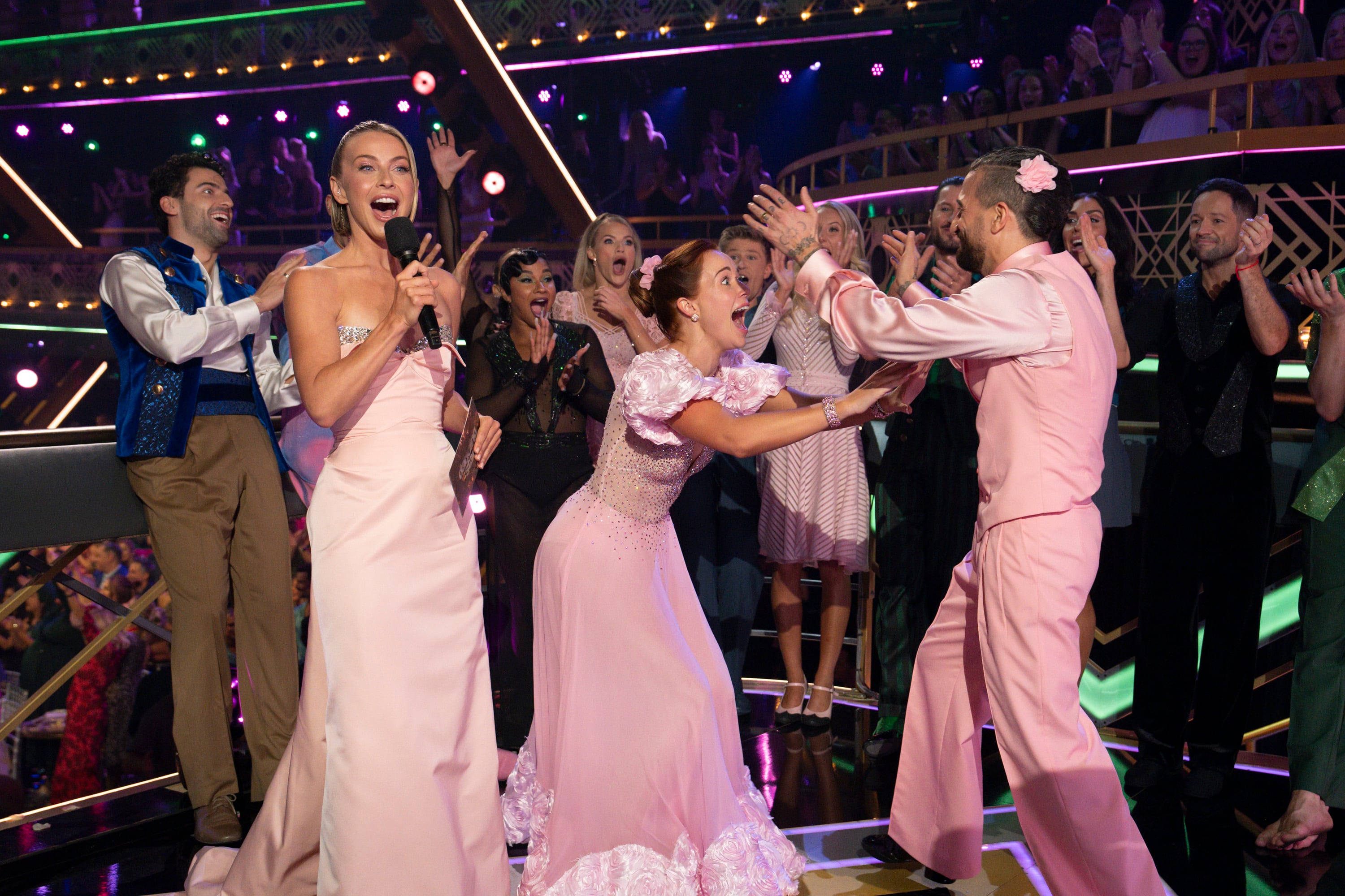 Whitney Leavitt and Mark Ballas react to their score after performing on “Wicked” night during Tuesday's "Dancing with the Stars" on ABC. Leavitt and Ballas each earned the first tens of the season