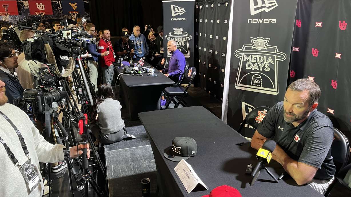 Utah first-year head coach Alex Jensen speaks with reporters during Big 12 basketball media days, Wednesday, Oct. 23, 2025 at the T-Mobile Center in Kansas City, Missouri.