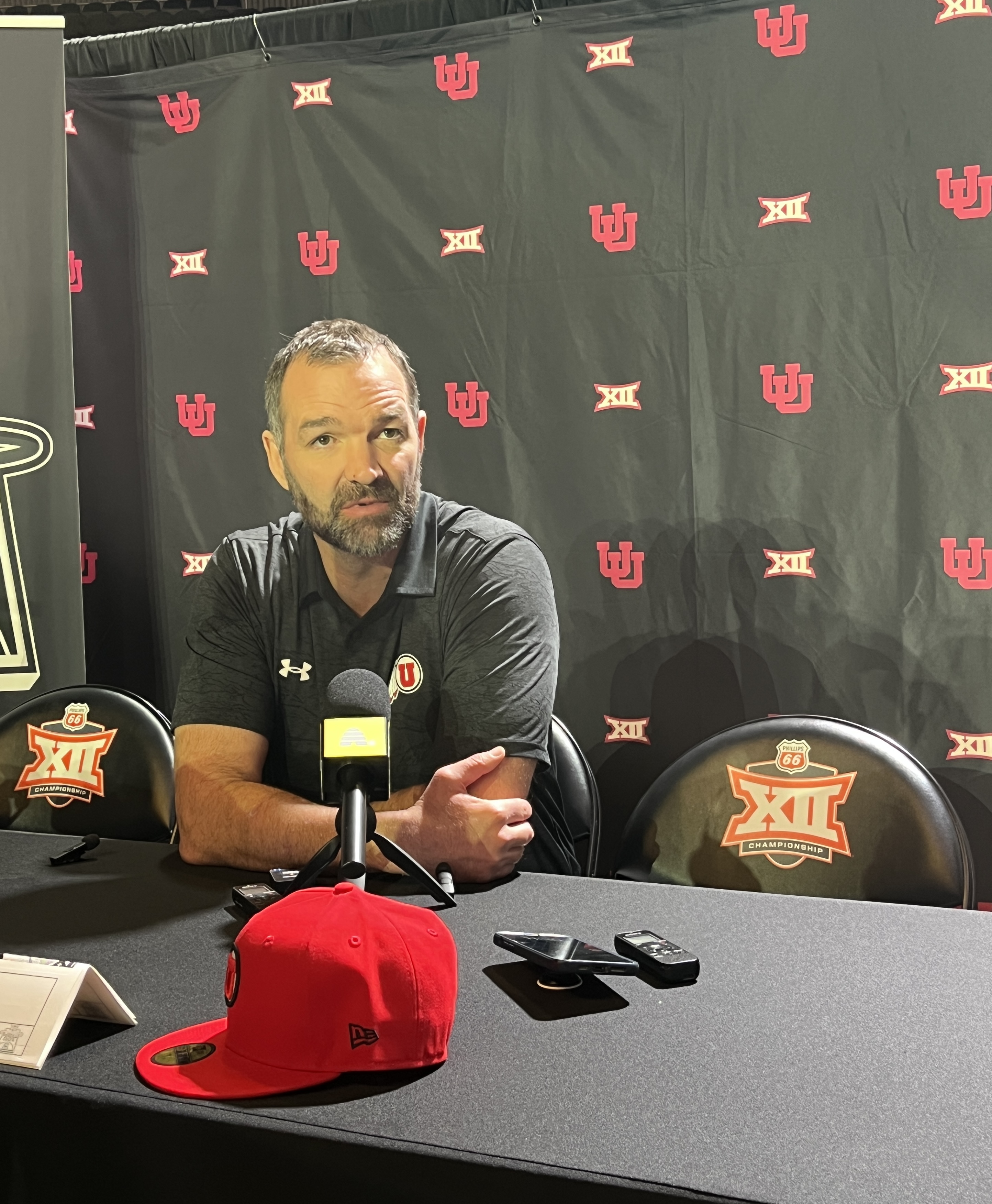 Utah first-year head coach Alex Jensen speaks with reporters during Big 12 basketball media days, Wednesday, Oct. 23, 2025 at the T-Mobile Center in Kansas City, Missouri.