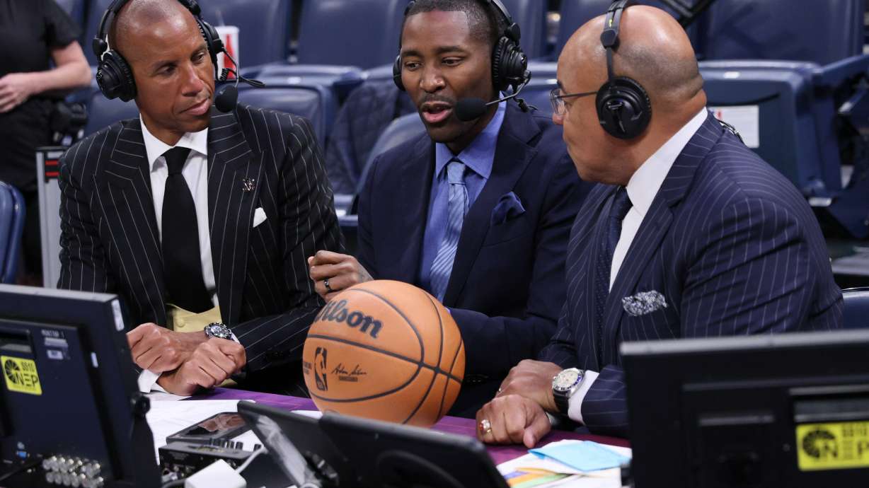 NBC Sports broadcasters, from left, Reggie Miller, Jamal Crawford and Mike Tirico talk after an NBA basketball game between the Houston Rockets and Oklahoma City Thunder, Tuesday, Oct. 21, 2025, in Oklahoma City.