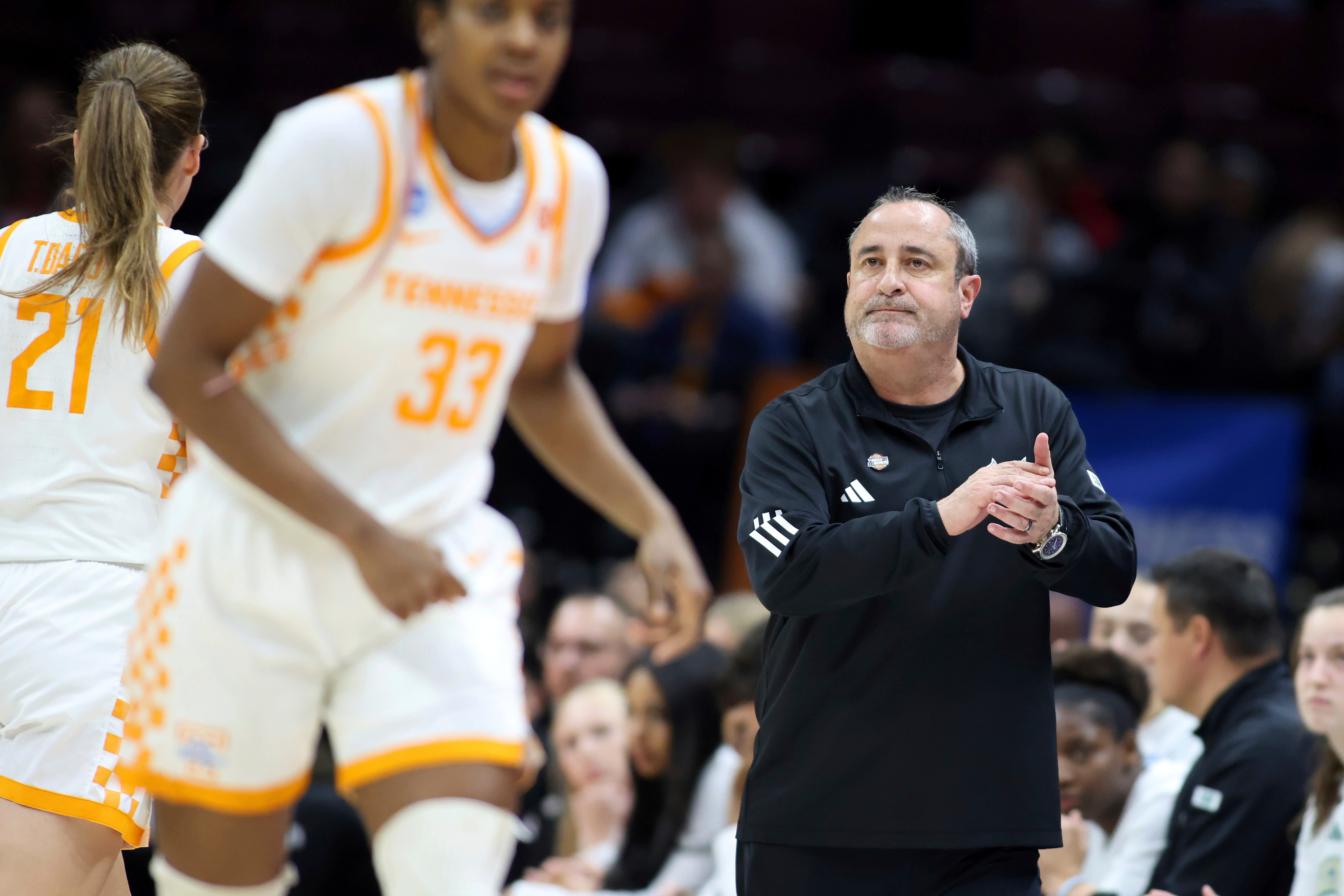 FILE - South Florida head coach Jose Fernandez, right, looks on as Tennessee pulls away during the fourth quarter of the first round of the NCAA college basketball tournament, March 21, 2025, in Columbus, Ohio. 