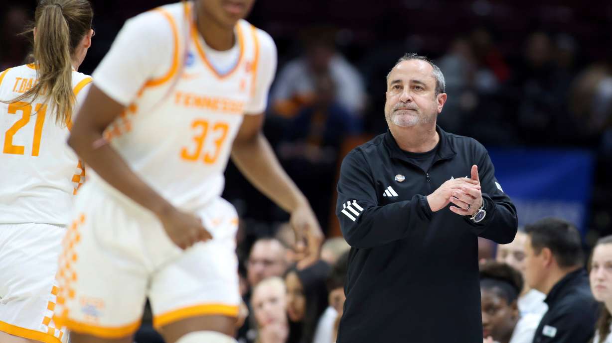 FILE - South Florida head coach Jose Fernandez, right, looks on as Tennessee pulls away during the fourth quarter of the first round of the NCAA college basketball tournament, March 21, 2025, in Columbus, Ohio.