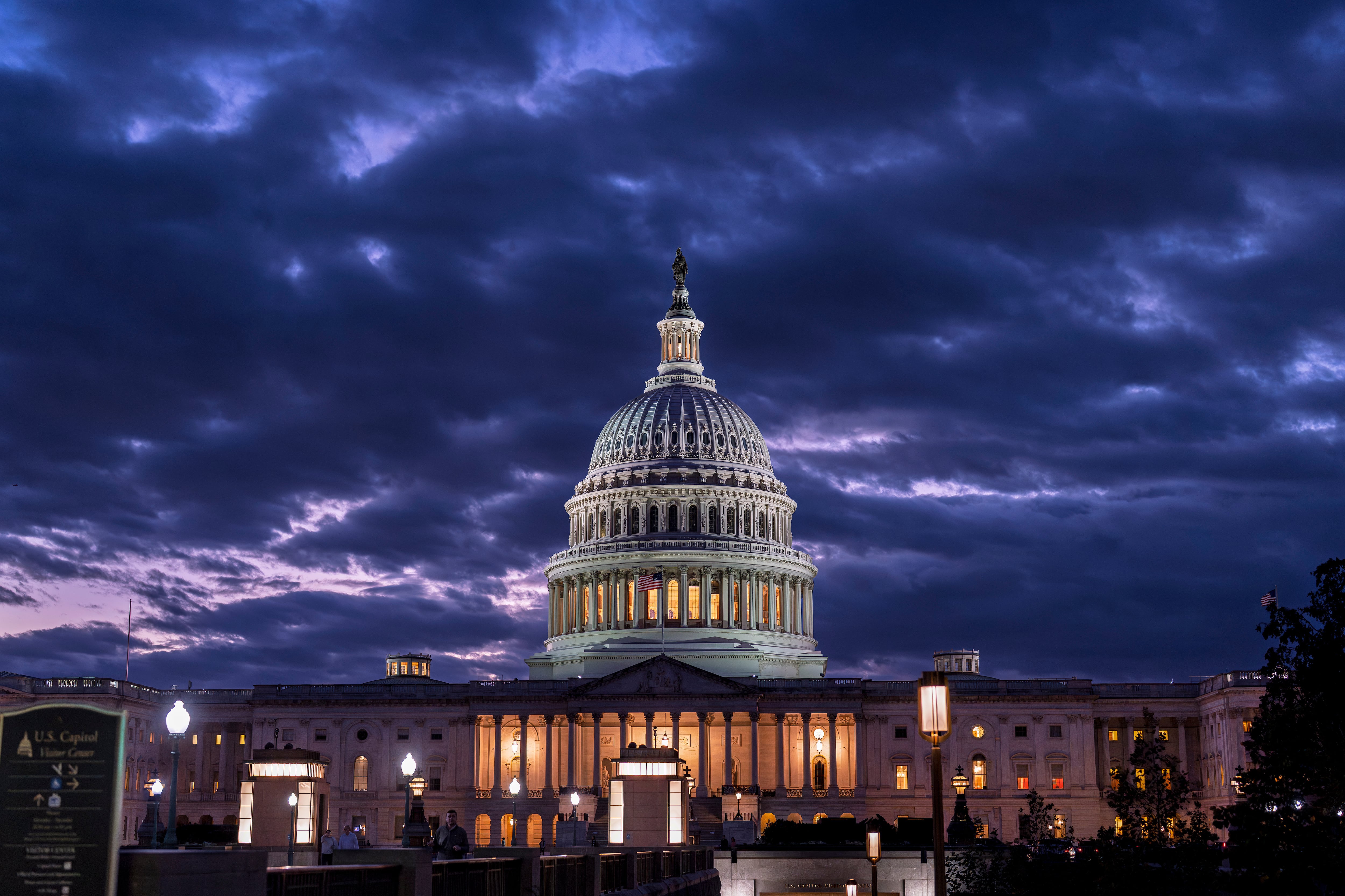The Capitol is seen at nightfall on day 22 of a government shutdown in Washington, Wednesday.