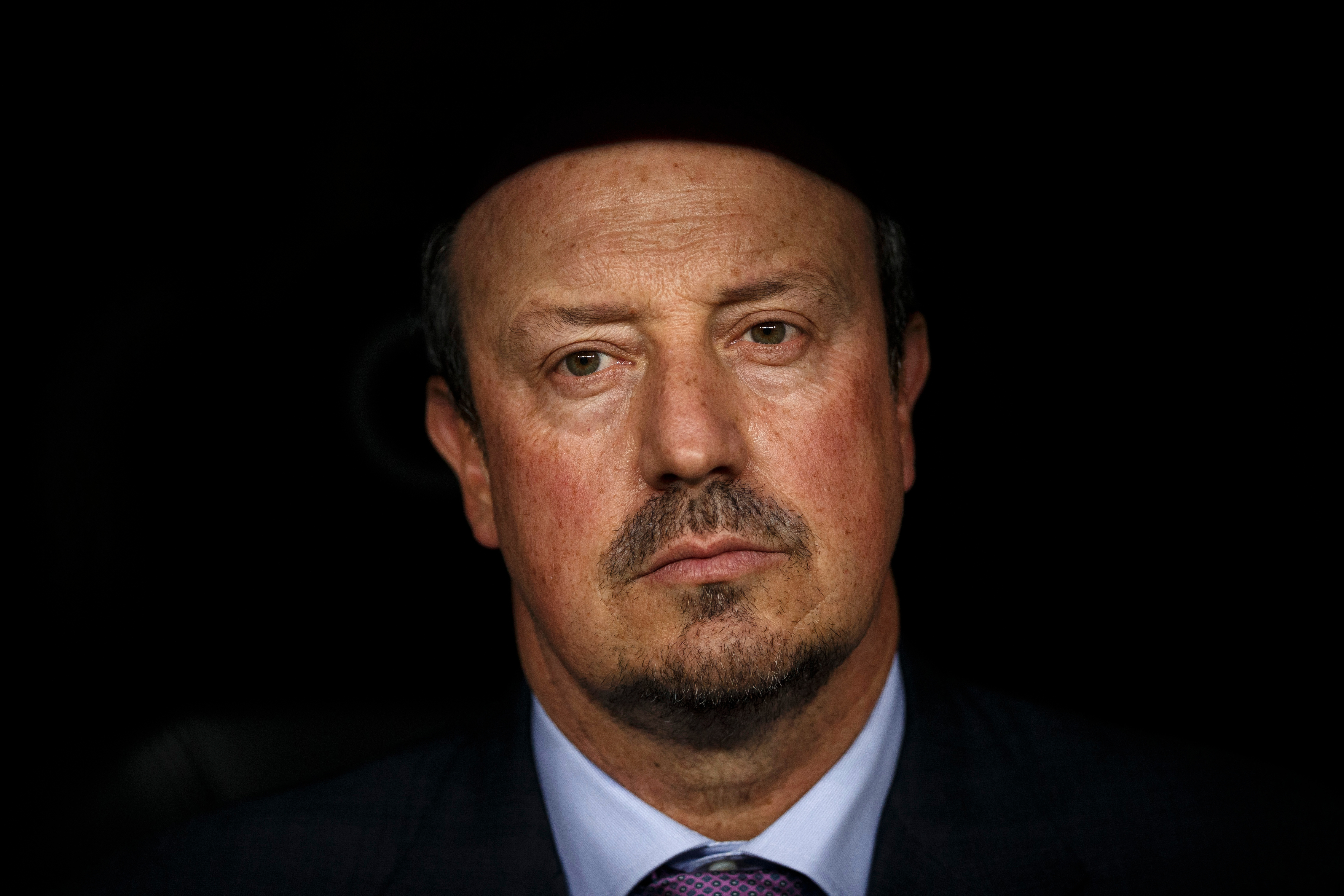 FILE -Real Madrid's head coach Rafa Benitez sits on the bench moments before the Santiago Bernabeu trophy soccer match between Real Madrid and Galatasaray at the Santiago Bernabeu stadium, in Madrid, Aug. 18, 2015. 