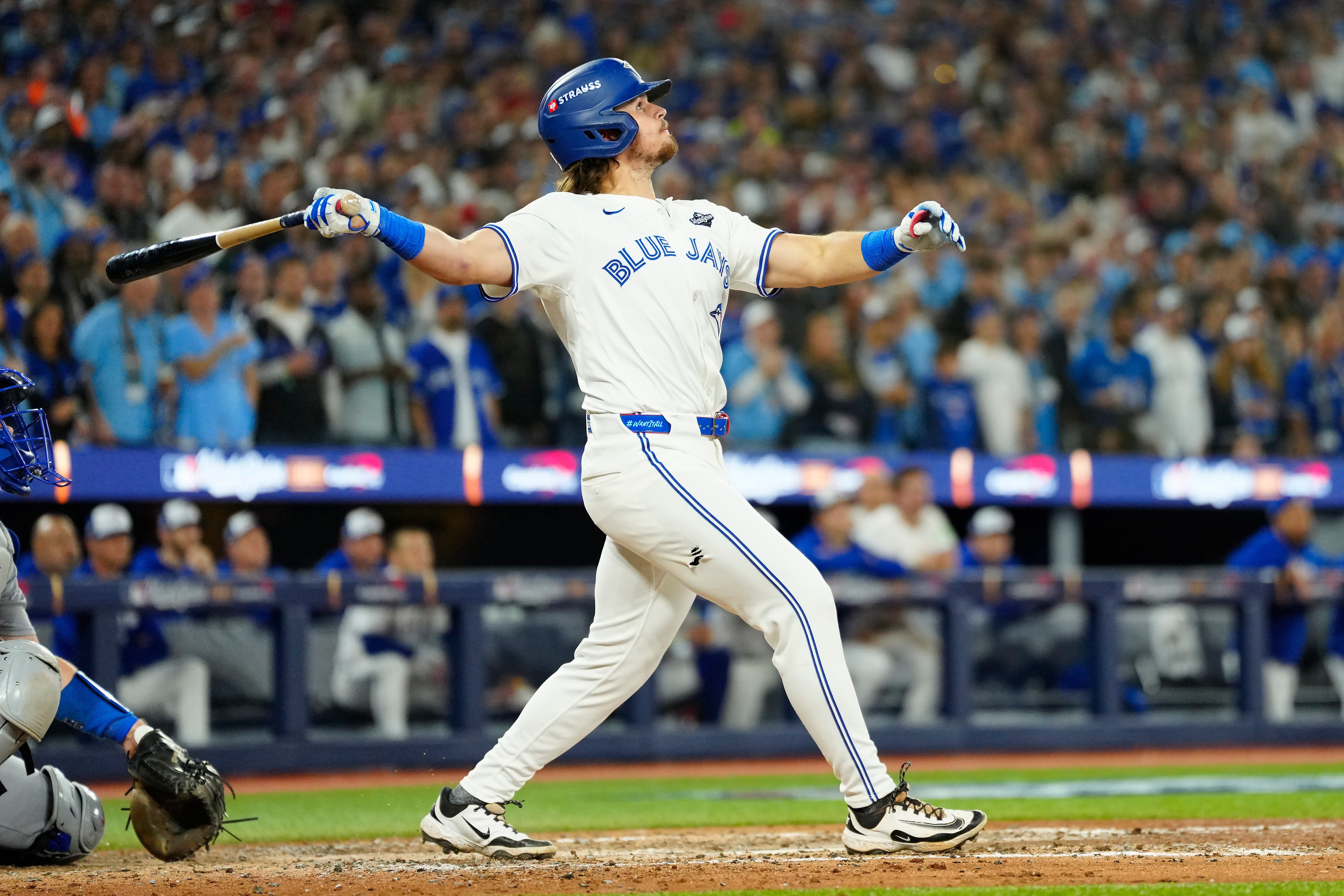 Toronto Blue Jays' Addison Barger watches his grand slam against the Los Angeles Dodgers during the sixth inning of Game 1 of baseball's World Series in Toronto, Friday, Oct. 24, 2025. 