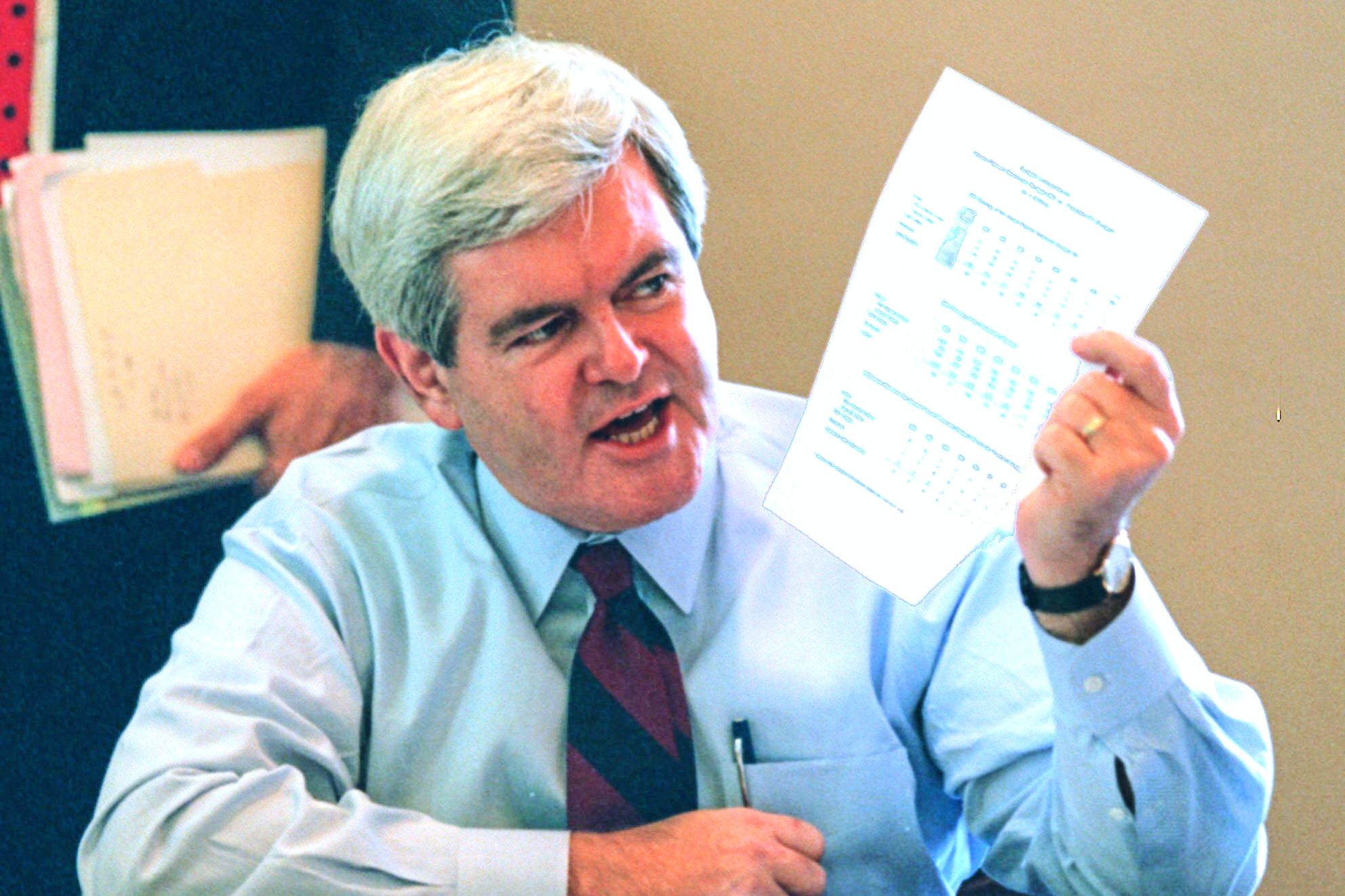 Then-House Speaker Newt Gingrich holds a sheet of budget figures on Capitol Hill, Nov. 15, 1995, during a meeting to discuss the federal budget impasse. Scholar Gordon S. Wood's work earned him a compliment from Gingrich, calling Wood's "The Radicalism of the American Revolution" an essential work of history.