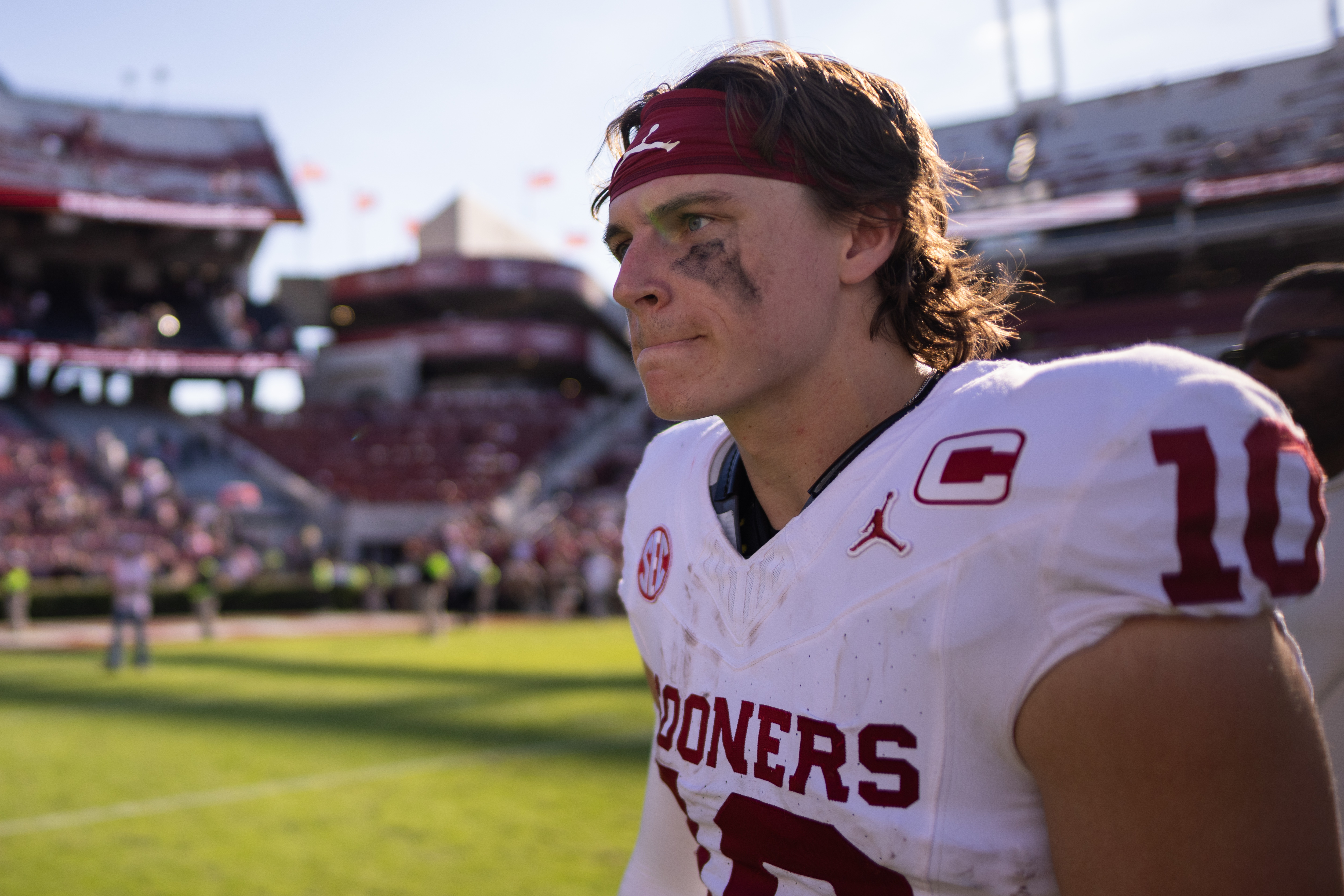 Oklahoma quarterback John Mateer (10) walks off after defeating South Carolina in an NCAA college football game, Saturday, Oct. 18, 2025, in Columbia, S.C. 