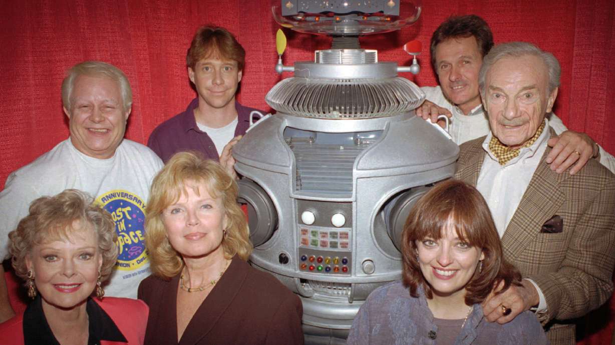 The original cast of the television series "Lost in Space" in Boston on Dec. 2, 1995. June Lockhart, a member of the cast, died Thursday at age 100.