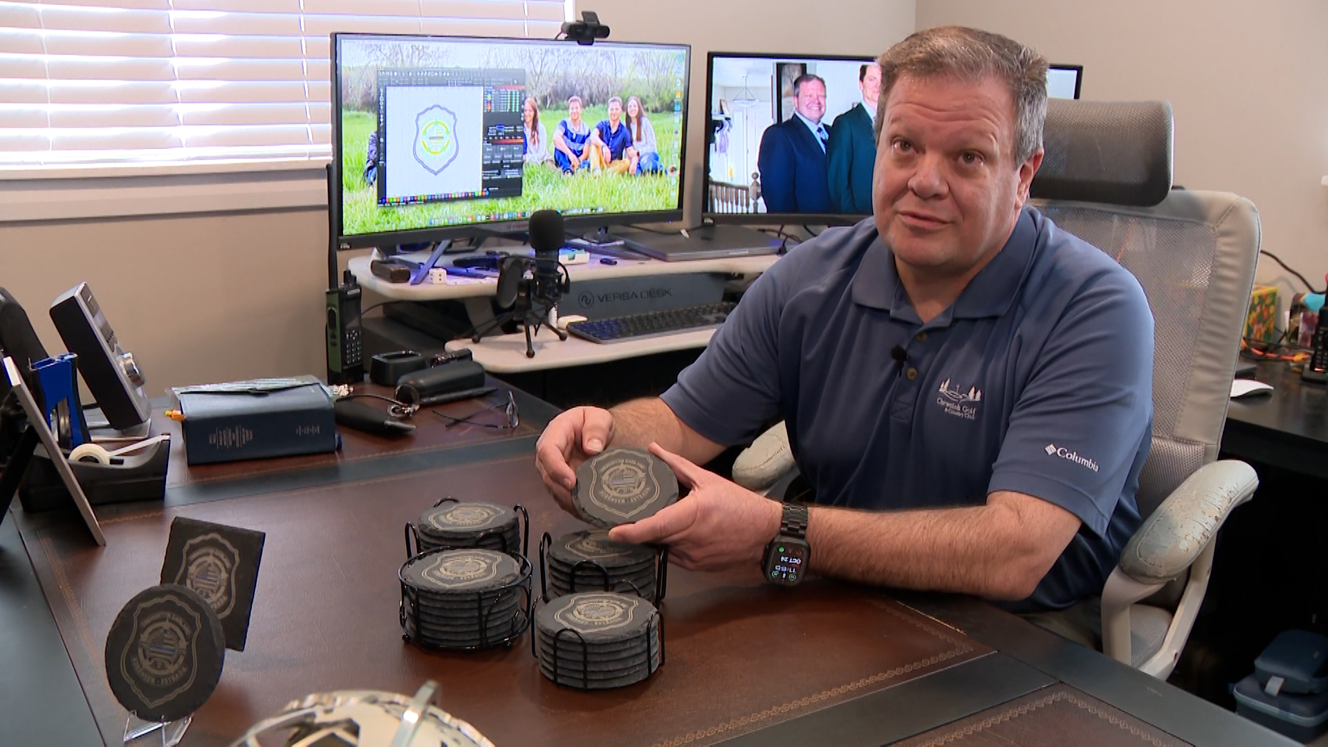 Darren Jex holds one of his laser-etched coasters at his home in Willard, Box Elder County. They're part of fundraising efforts to get Tremonton-Garland police officers to Washington, D.C., for National Police Week in May.