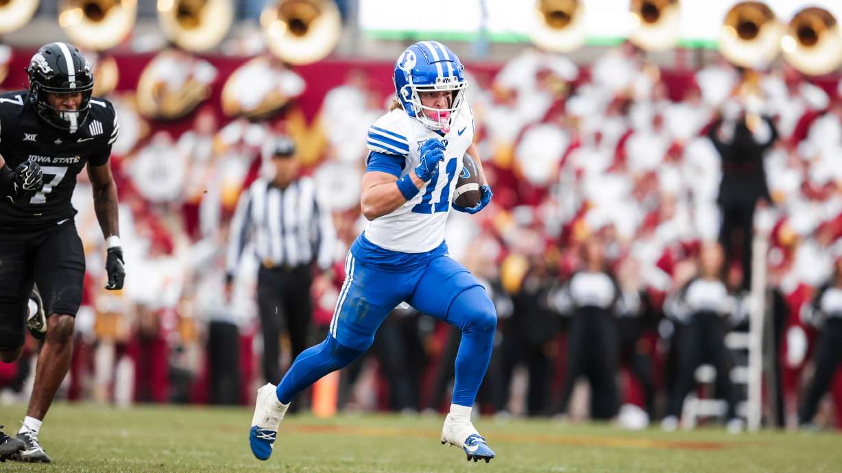BYU's Parker Kingston runs for extra yardage during the Cougars' Big 12 football game at Iowa State, Saturday, Oct. 25, 2025 at Jack Trice Stadium in Ames, Iowa.