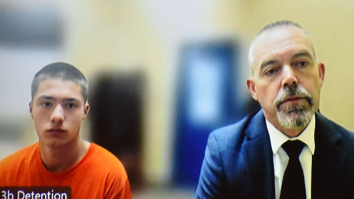 Bobby Jackson and his public defender, Jordan Crane, on Friday, during Jackson's initial appearance. Jackson was charged with first-degree murder in the killing of Rebecca Rivera.
