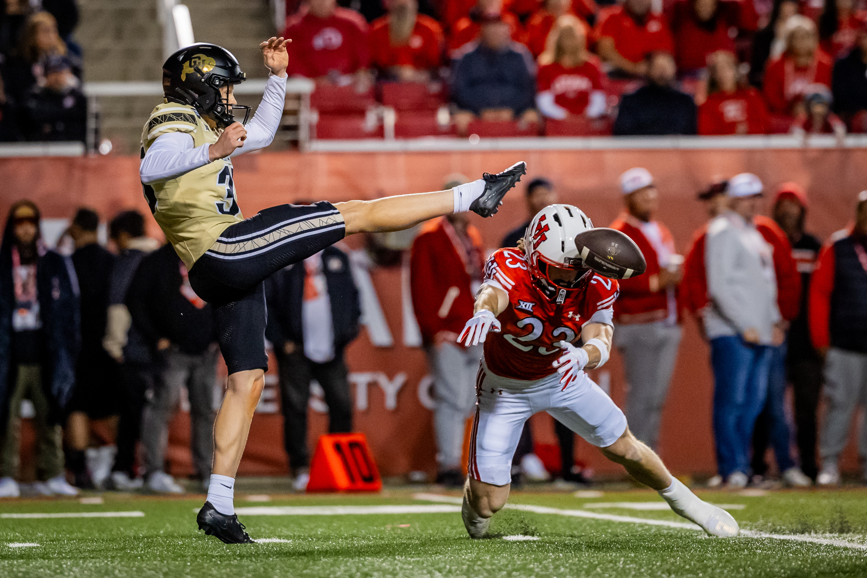 Utah Utes safety Jackson Bennee (23) blocks Colorado Buffaloes punter Damon Greaves’ (35) punt during an NCAA football game at Rice-Eccles Stadium in Salt Lake City on Saturday, Oct. 25, 2025.