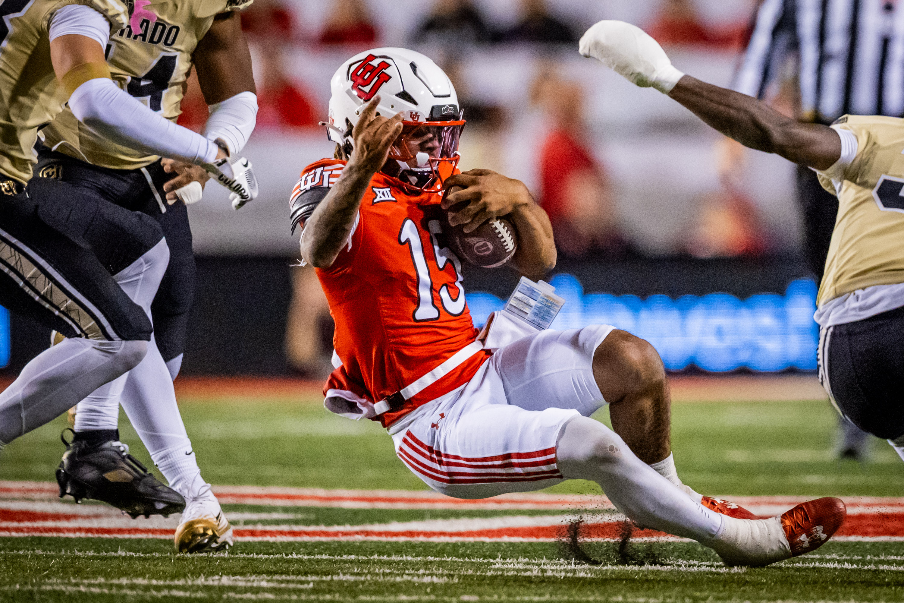 Utah Utes quarterback Byrd Ficklin (15) runs the ball during an NCAA football game against the Colorado Buffaloes at Rice-Eccles Stadium  in Salt Lake City on Saturday, Oct. 25, 2025.