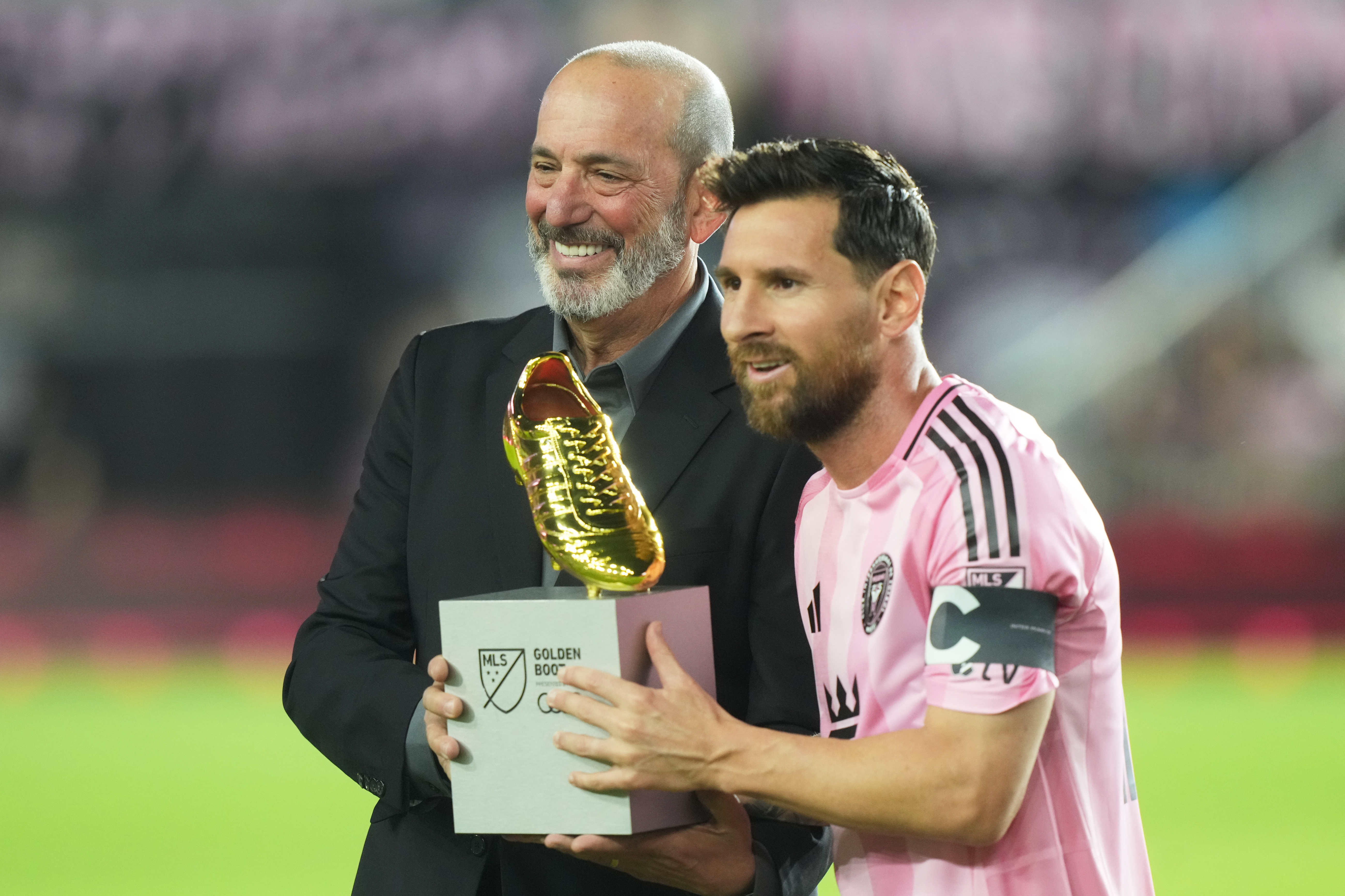 MLS Commissioner Don Garber presents the Golden Boot award to Inter Miami forward Lionel Messi before match one of an MLS playoff opening round soccer match against the Nashville SC, Friday, Oct. 24, 2025, in Fort Lauderdale, Fla.