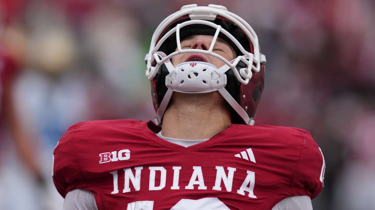 Indiana quarterback Alberto Mendoza (16) reacts after rushing for a touchdown during the second half of an NCAA college football game against UCLA, Saturday, Oct. 25, 2025, in Bloomington, Ind.