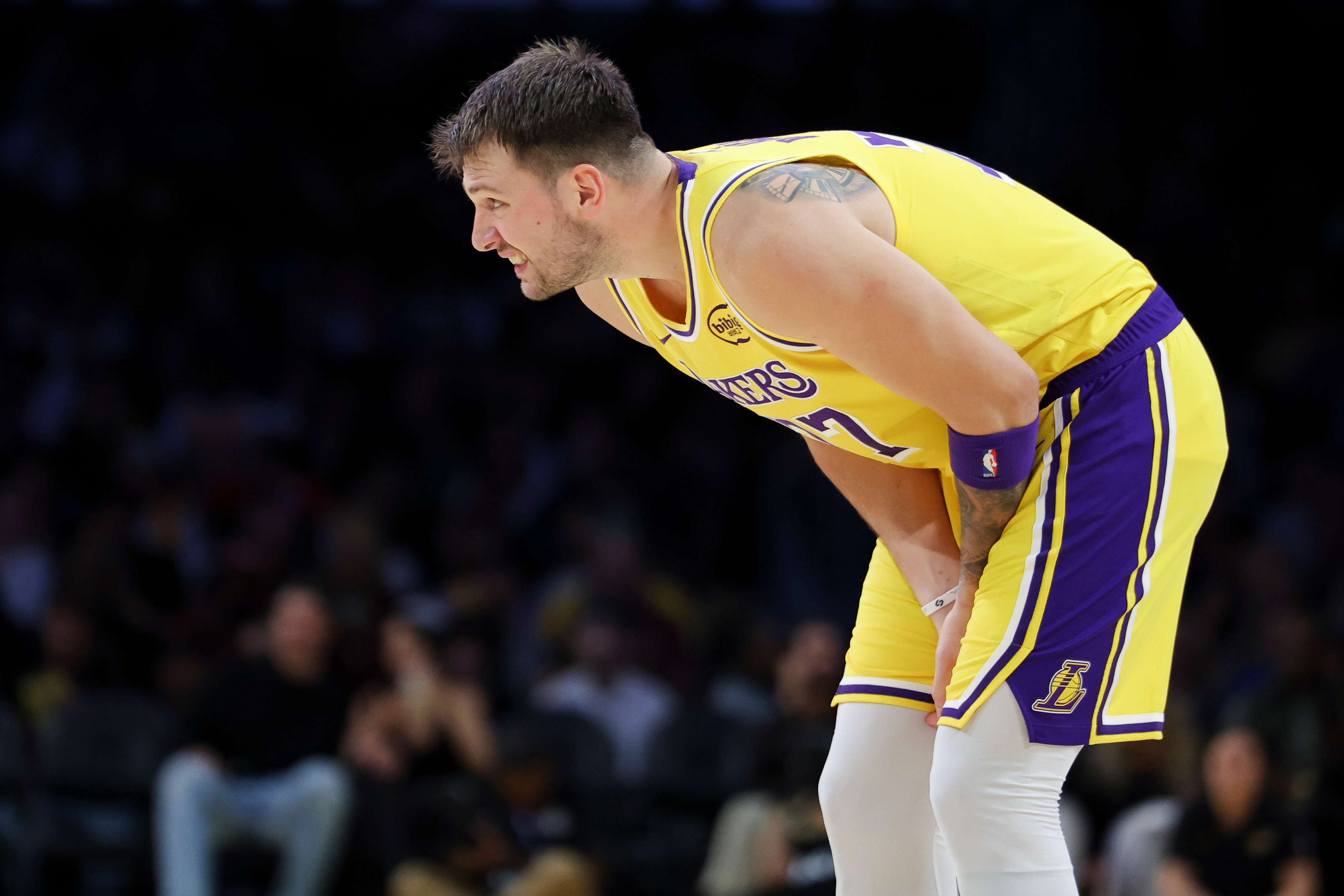 Los Angeles Lakers guard Luka Doncic reacts during the first half of an NBA basketball game against the Minnesota Timberwolves, Friday, Oct. 24, 2025, in Los Angeles. 
